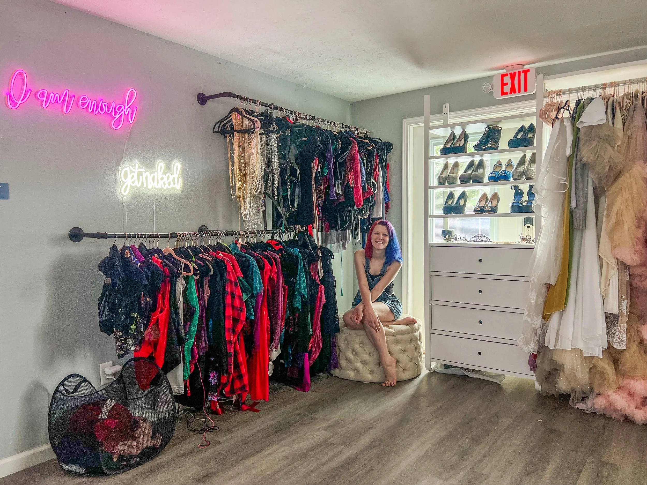 Tiffany Joyce sitting inside the Hype Girl Boudoir client closet in Jacksonville, Florida