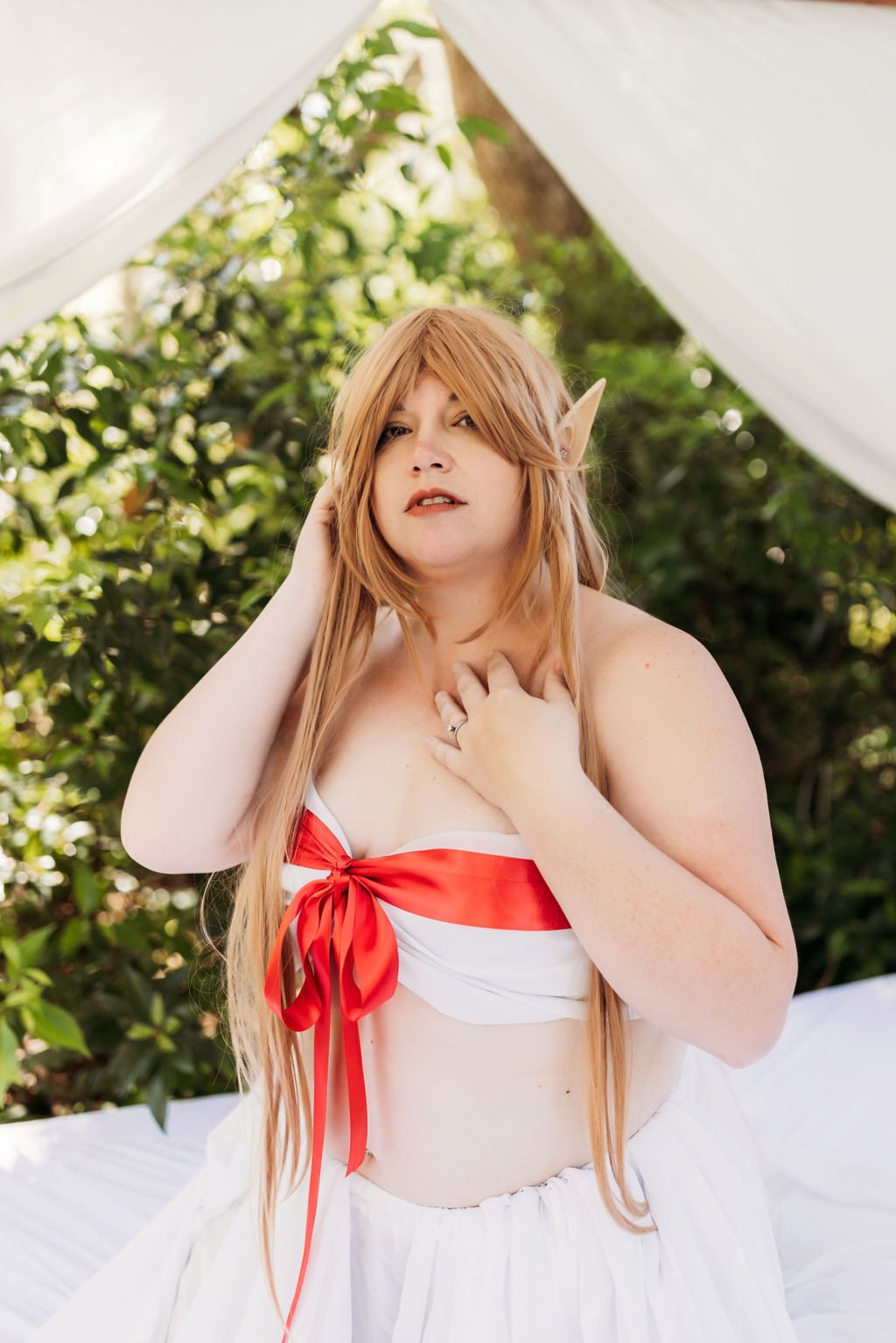 Woman wearing an Asuna cosplay outfit during an outdoor boudoir session in Jacksonville, Florida