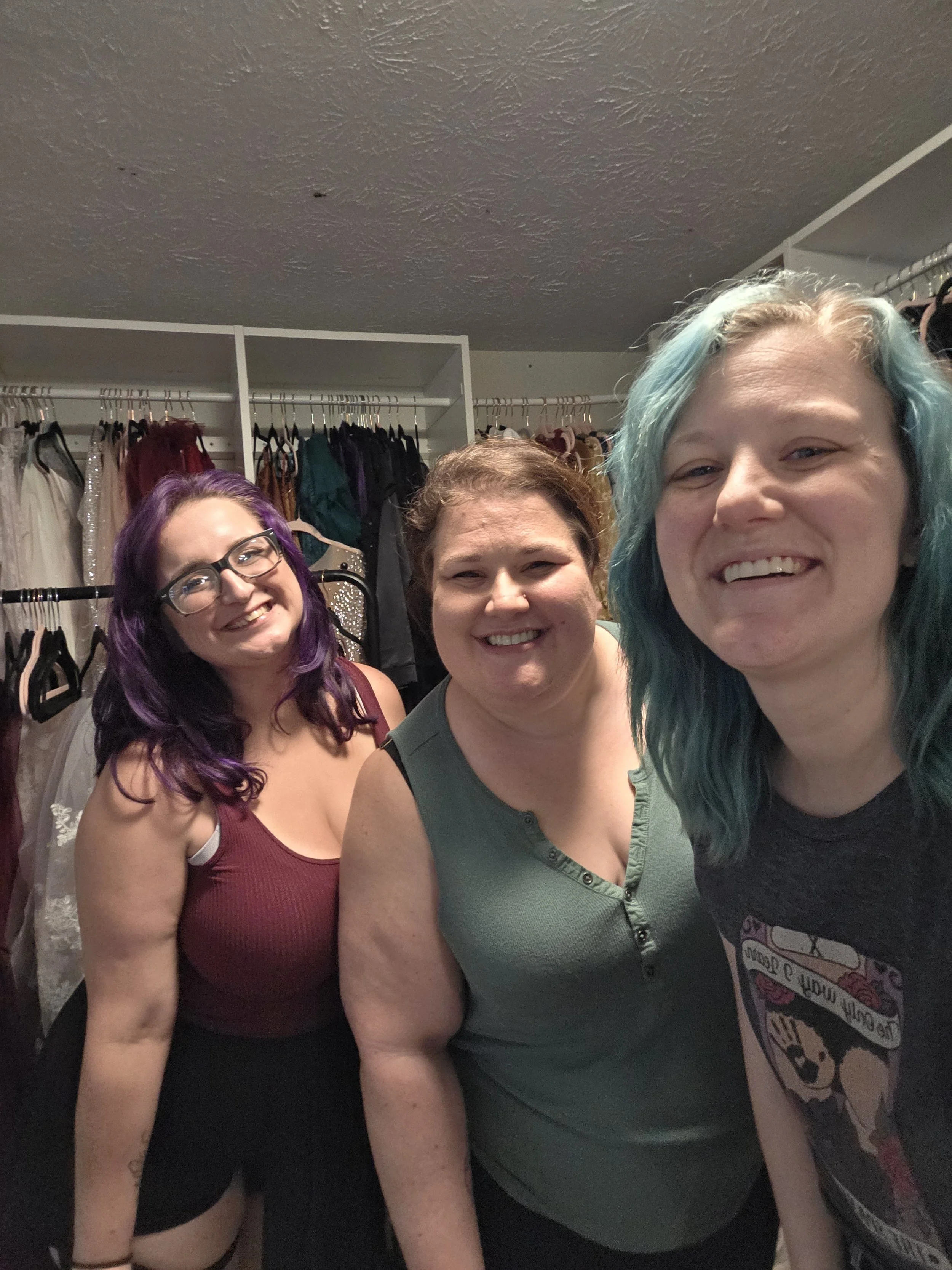 Tiffany Joyce with two women during a boudoir planning consultation at Hype Girl Boudoir
