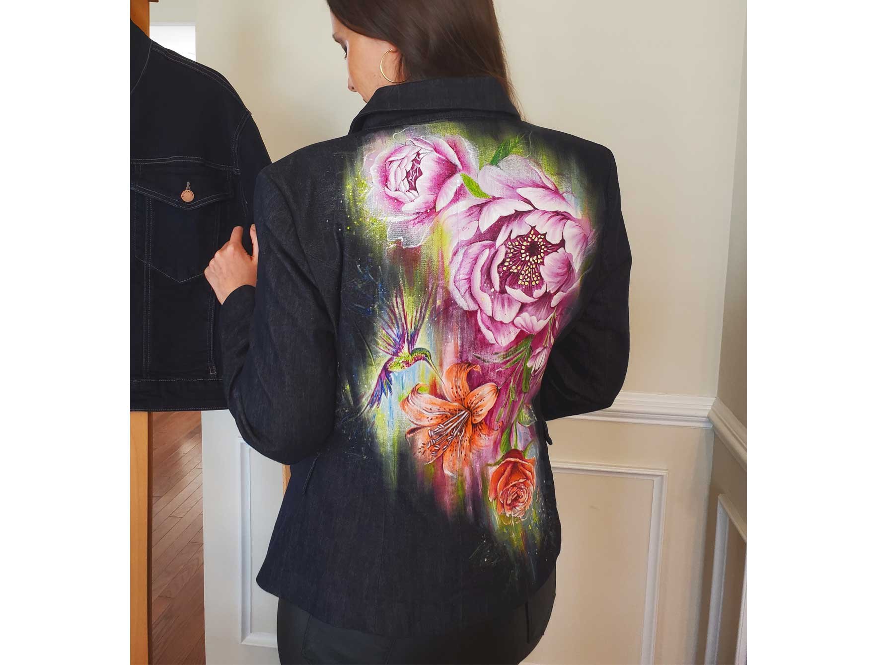 artist in hand-painted floral designer jacket