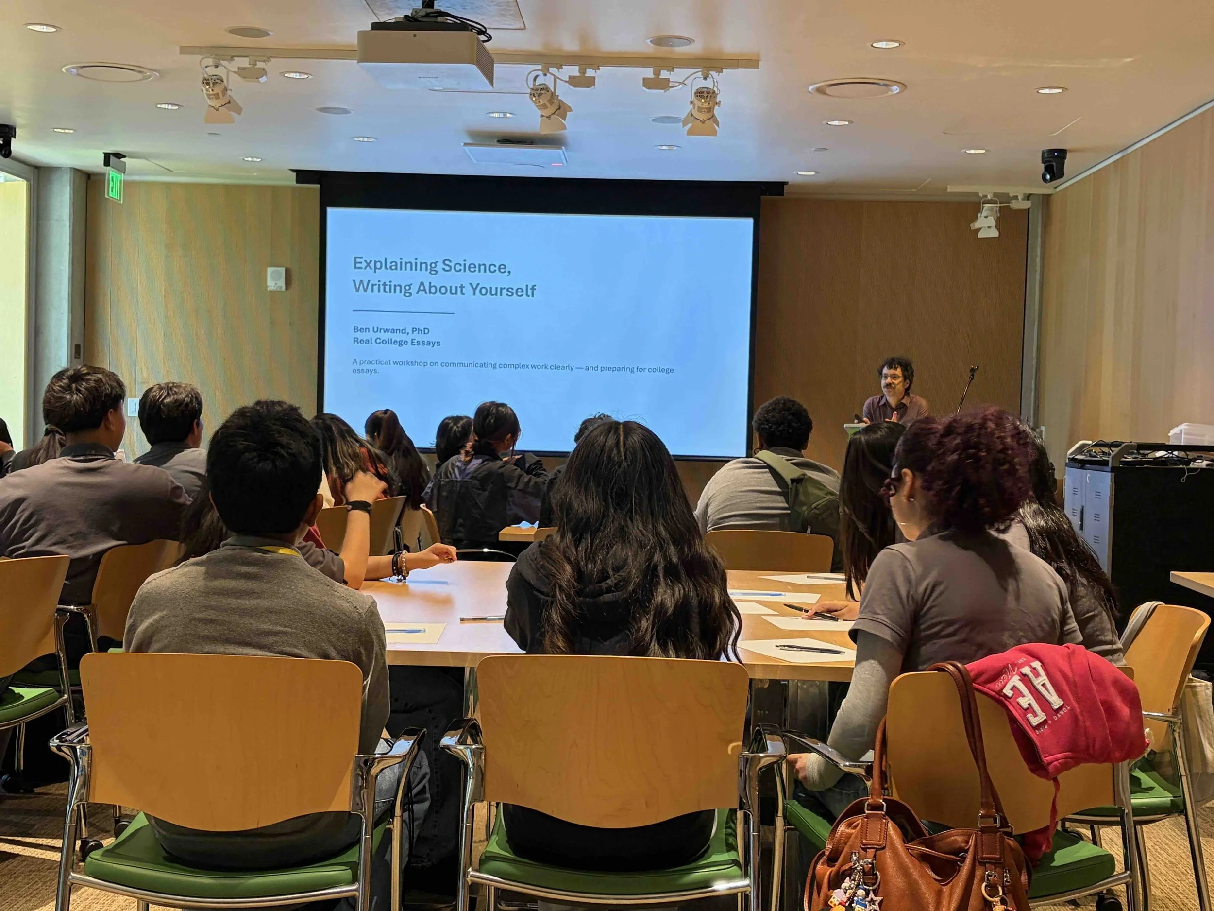 Ben Urwand leading a science communication and college essay workshop for high school interns at the California Academy of Sciences.