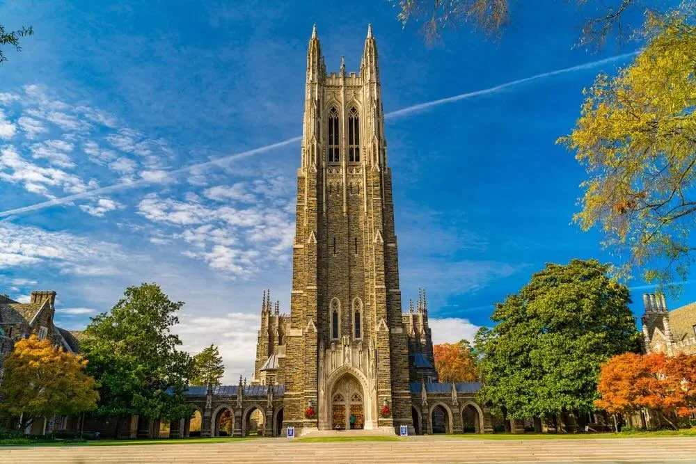 Duke University Chapel on campus with gothic architecture and trees in autumn