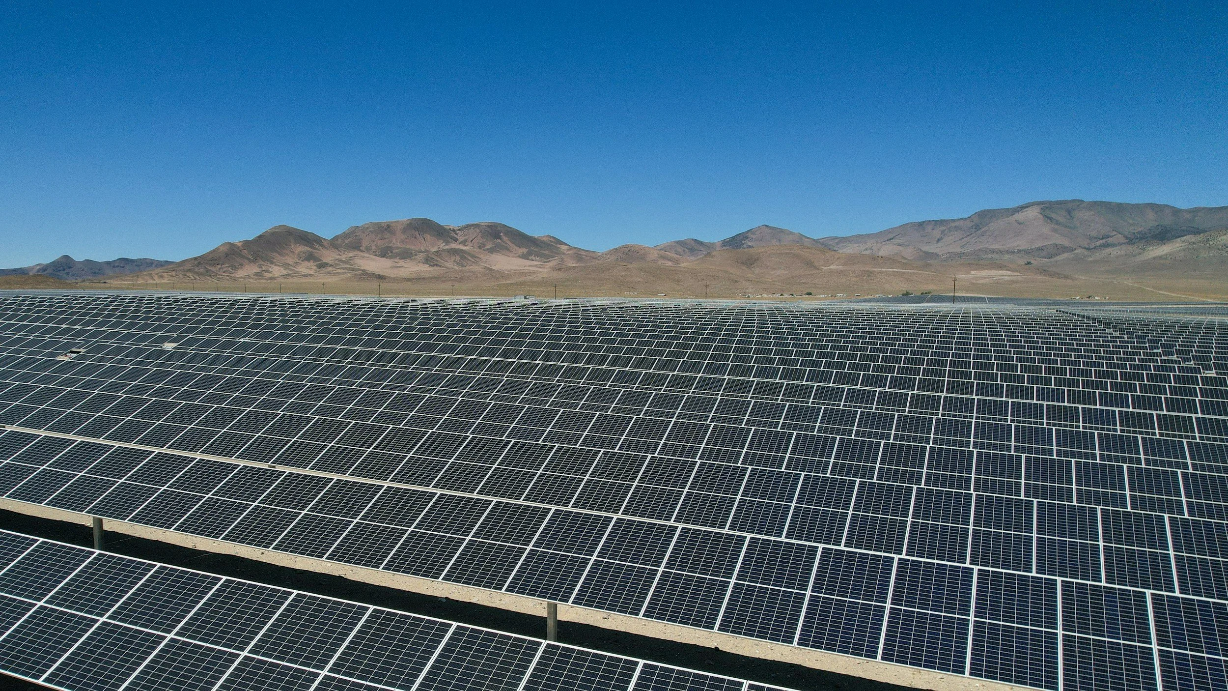 Utility-scale solar array in a desert valley