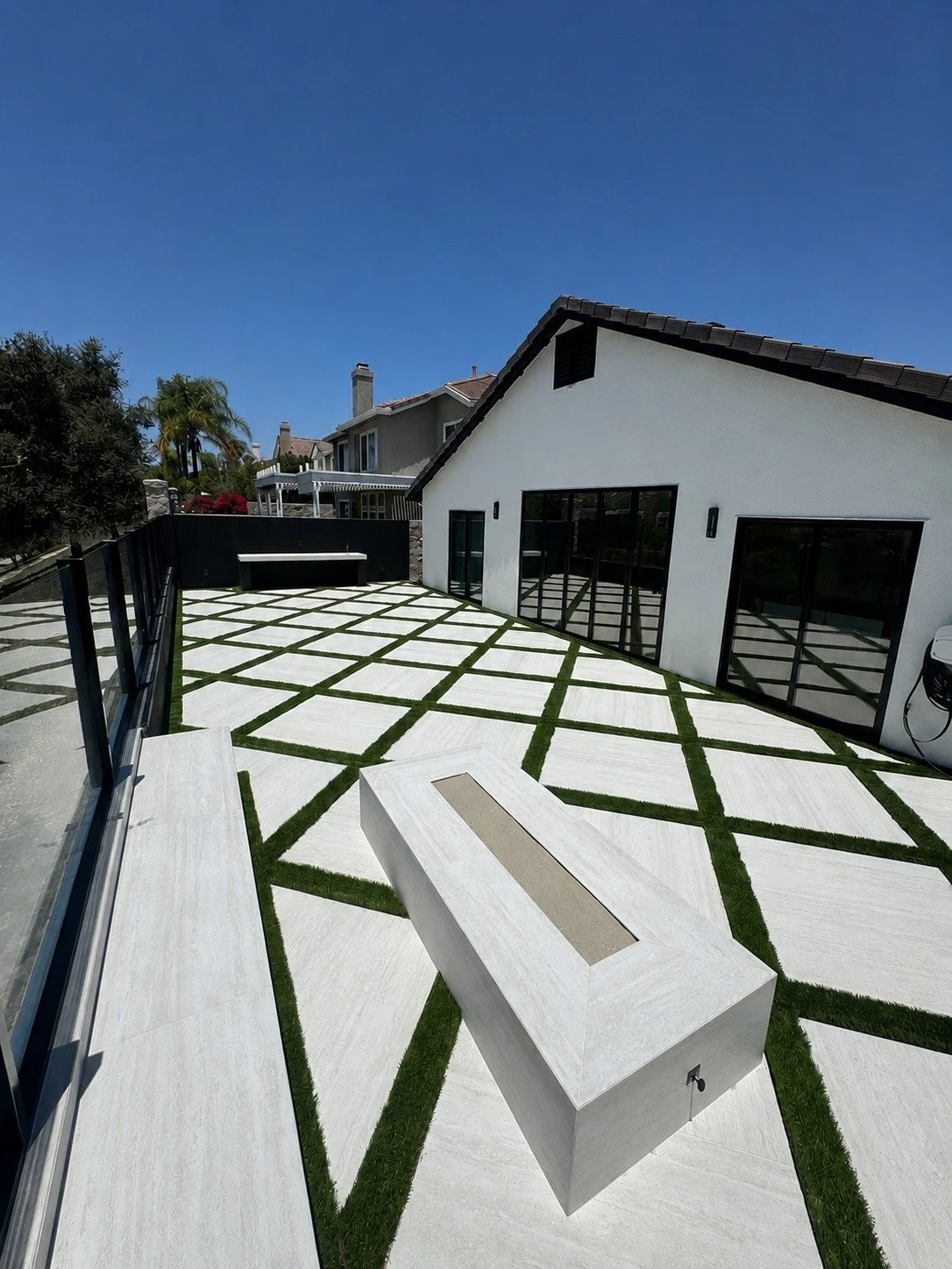 Paver Patio with Turf Inlays and Fire Pit