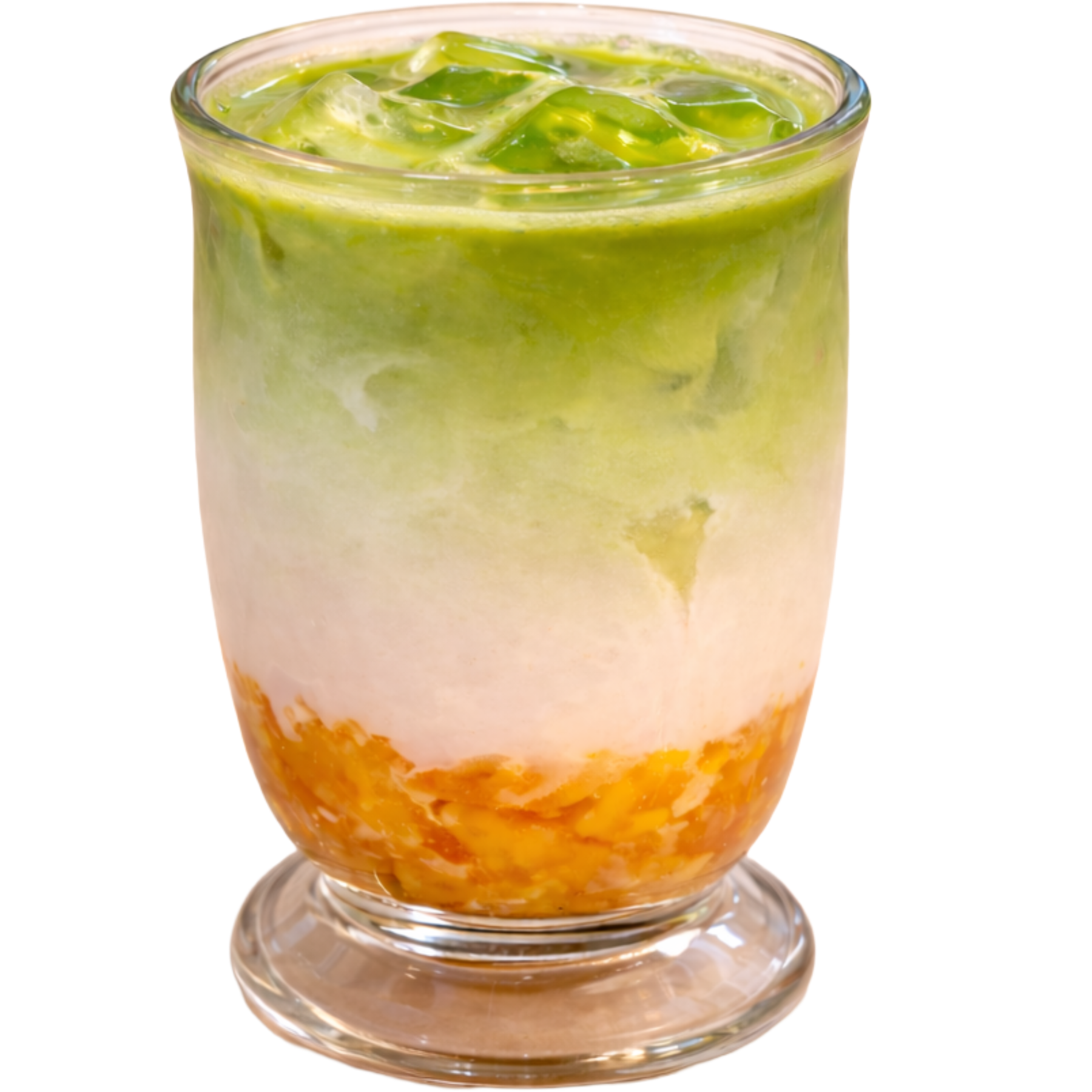 layered matcha latte with diced peach at the bottom