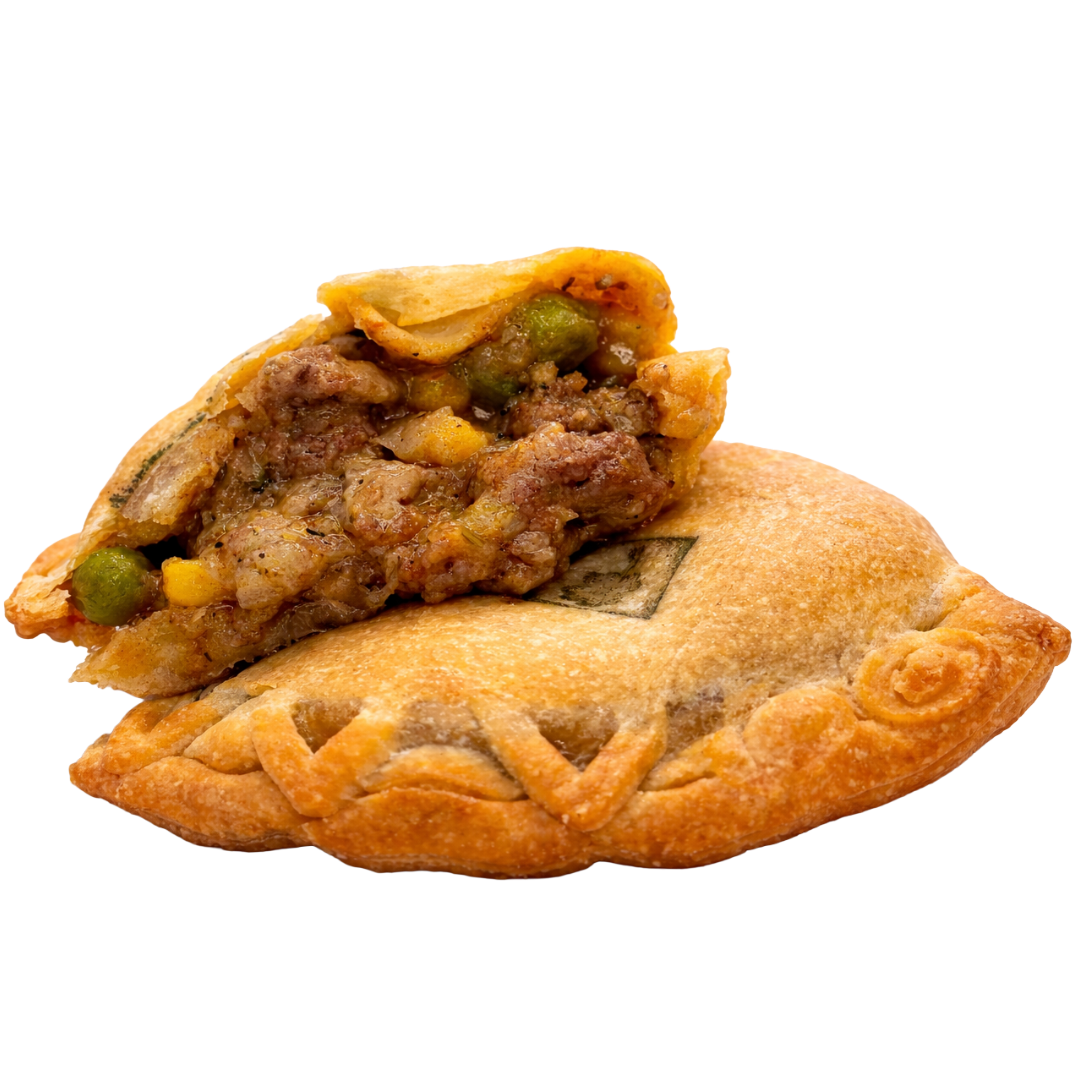 A fried pastry with a golden-brown exterior, cut open to reveal a filling of shepherds pie