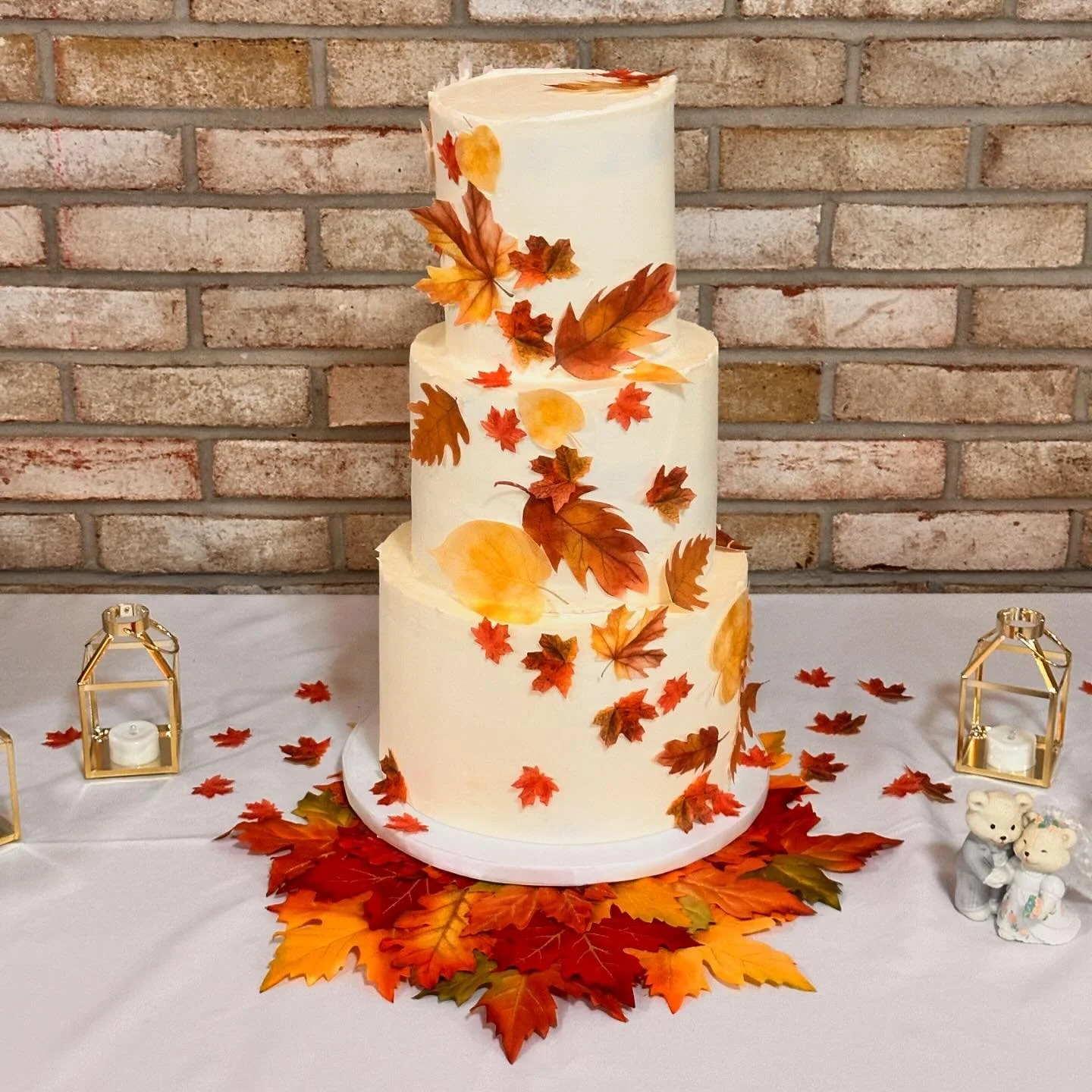 As my kiddos rake up leaves (not to be helpful, but to make a pile to jump in), I can&rsquo;t help but think about this fall lovely. 

A three tier wedding cake with edible leaves on what was a beautiful October day. Top and bottom tiers are spice ca