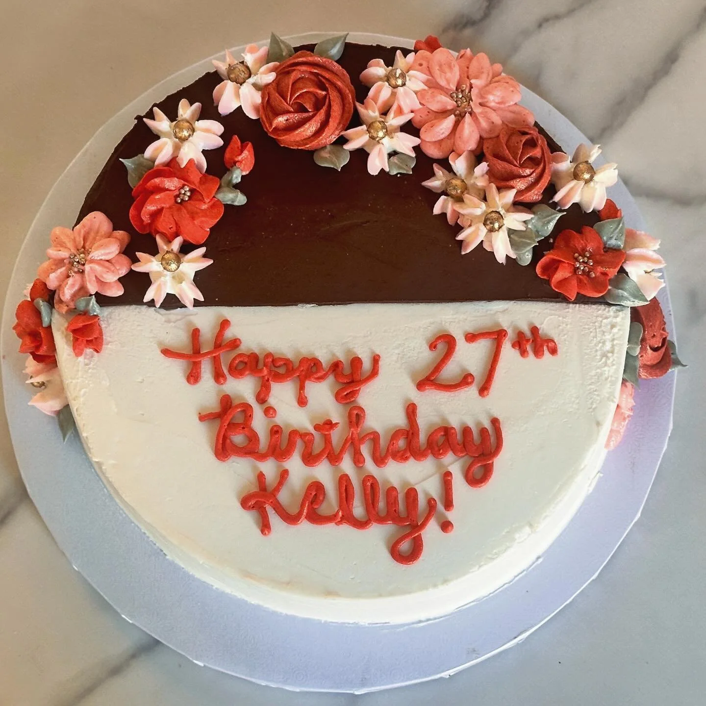 This cake request was very sweet: the client wanted to celebrate someone&rsquo;s birthday who was sharing their birthday with someone else&rsquo;s important event. A simple vanilla cake with half chocolate/half vanilla frosting. #verymindfulverydemur