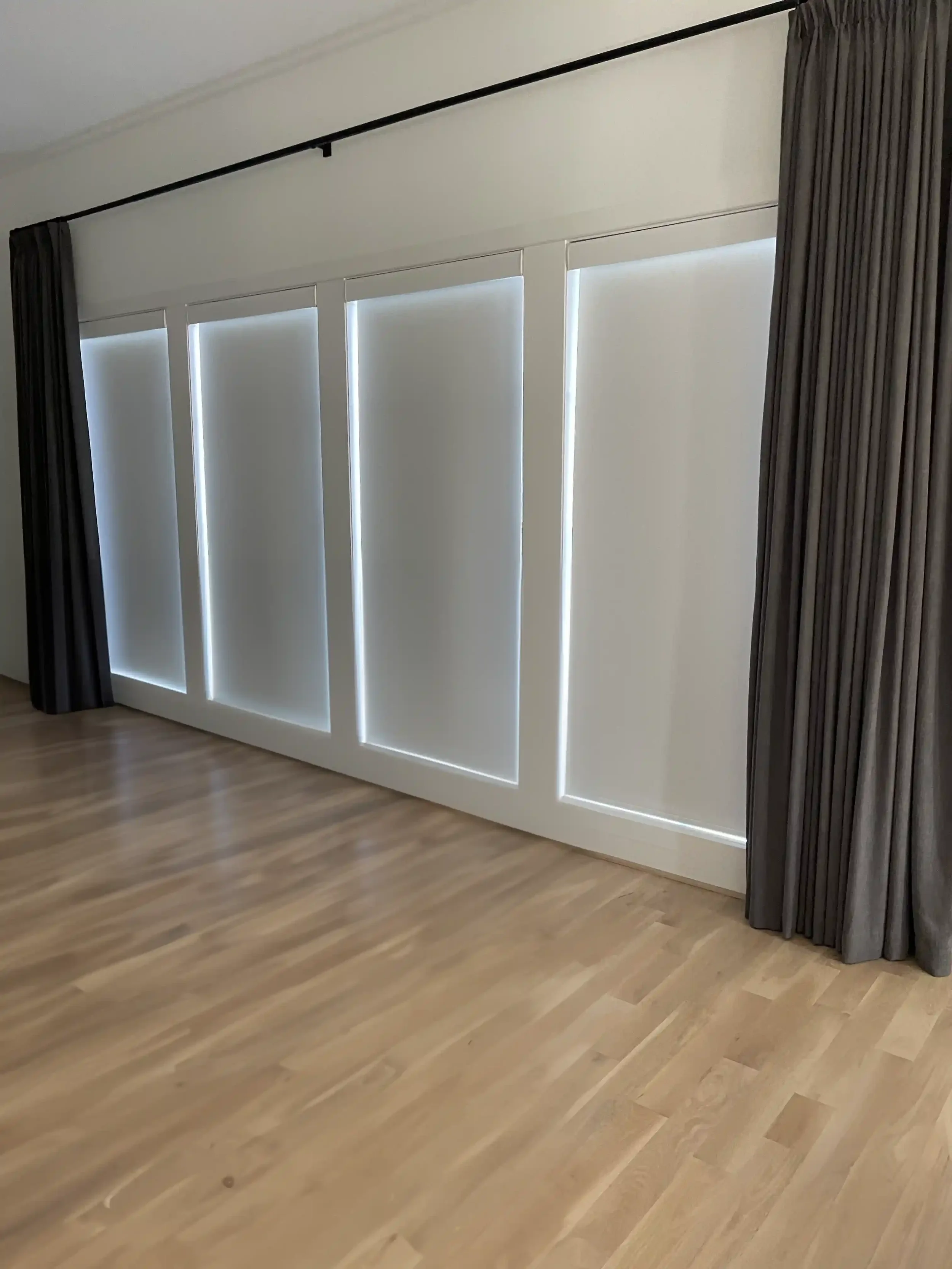 white-roller-shades-with-drapery.webp