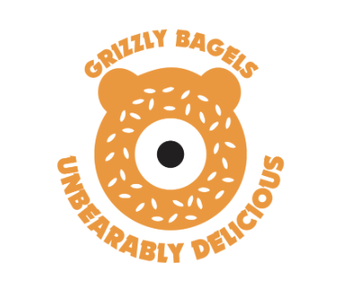 Logo of a bear-shaped bagel with the text 'Grizzly Bagels Unbearably Delicious' encircling it, featuring a bear face with bun ears and a sesame seed topping.