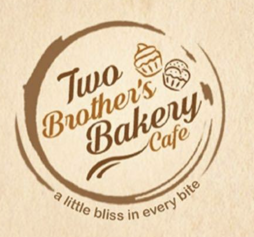 Logo for Two Brothers Bakery Cafe featuring cake and cupcake illustrations and the tagline 'a little bliss in every bite'.
