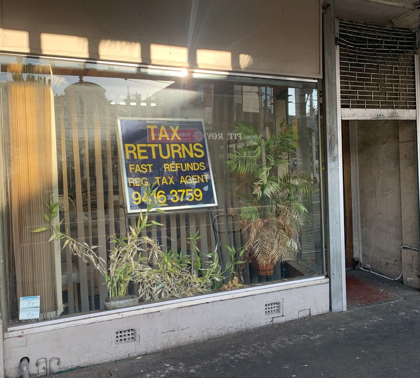 Just round the corner on Smith. One of the most iconic and enduring shop windows of our neighbourhood. Sad to see this one go. #taxreturns #shopwindows #peopleofgertrudestreet