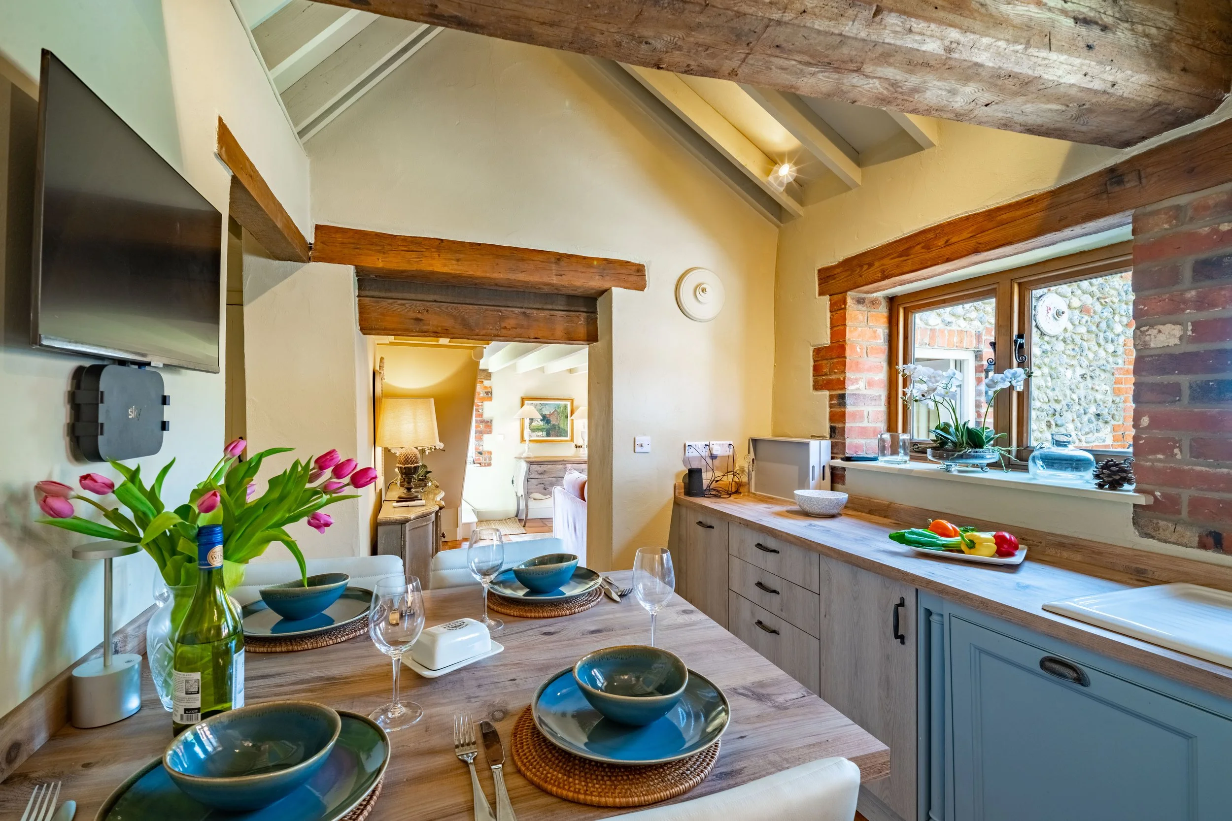 Our Cottage in Langham has a fully equipt Kitchen with a Breakfast Table that seats four overlooking the Sunny South Facing Walled Garden, perfect for two couples.