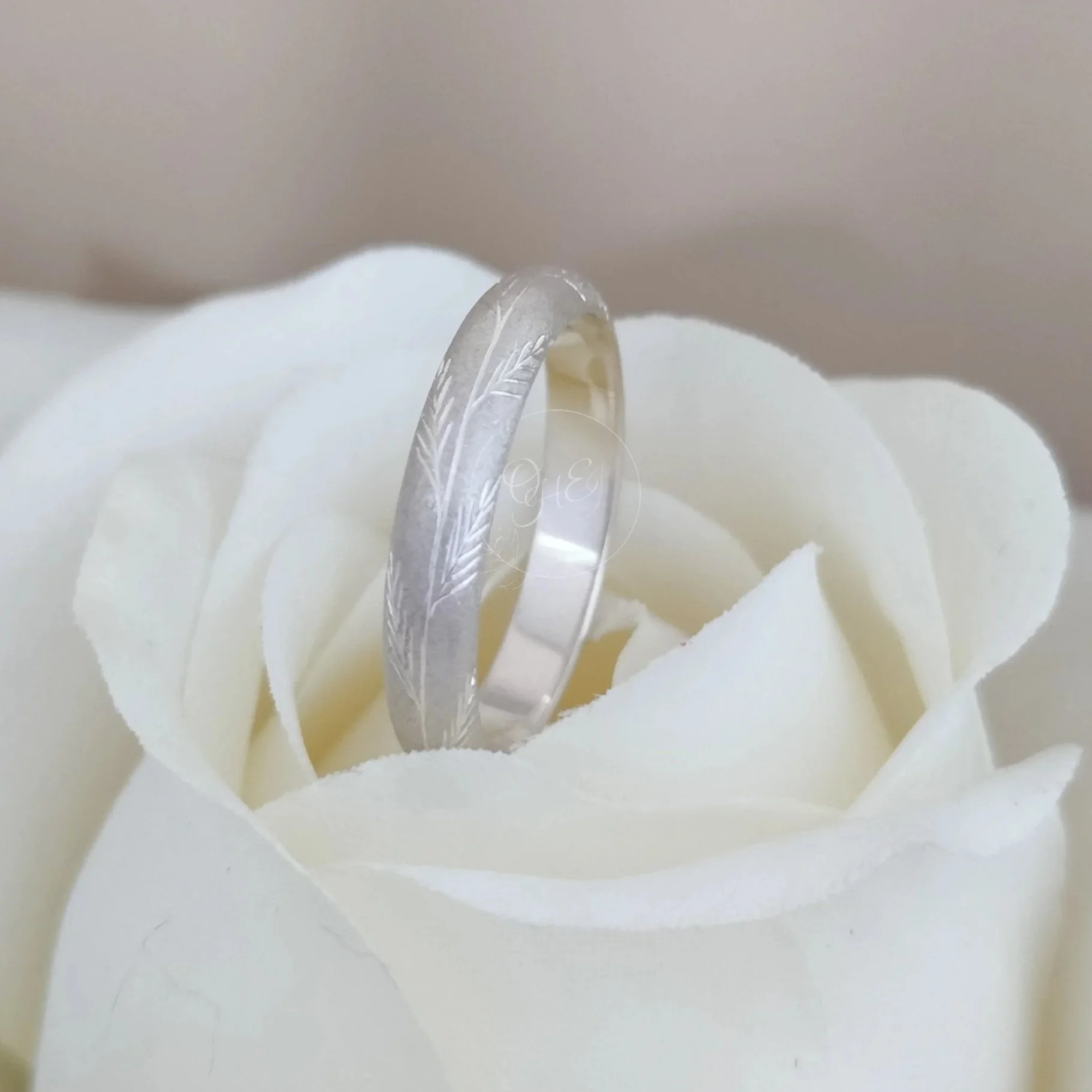 sterling+silver+wedding+ring+palm+engraving+.jpg