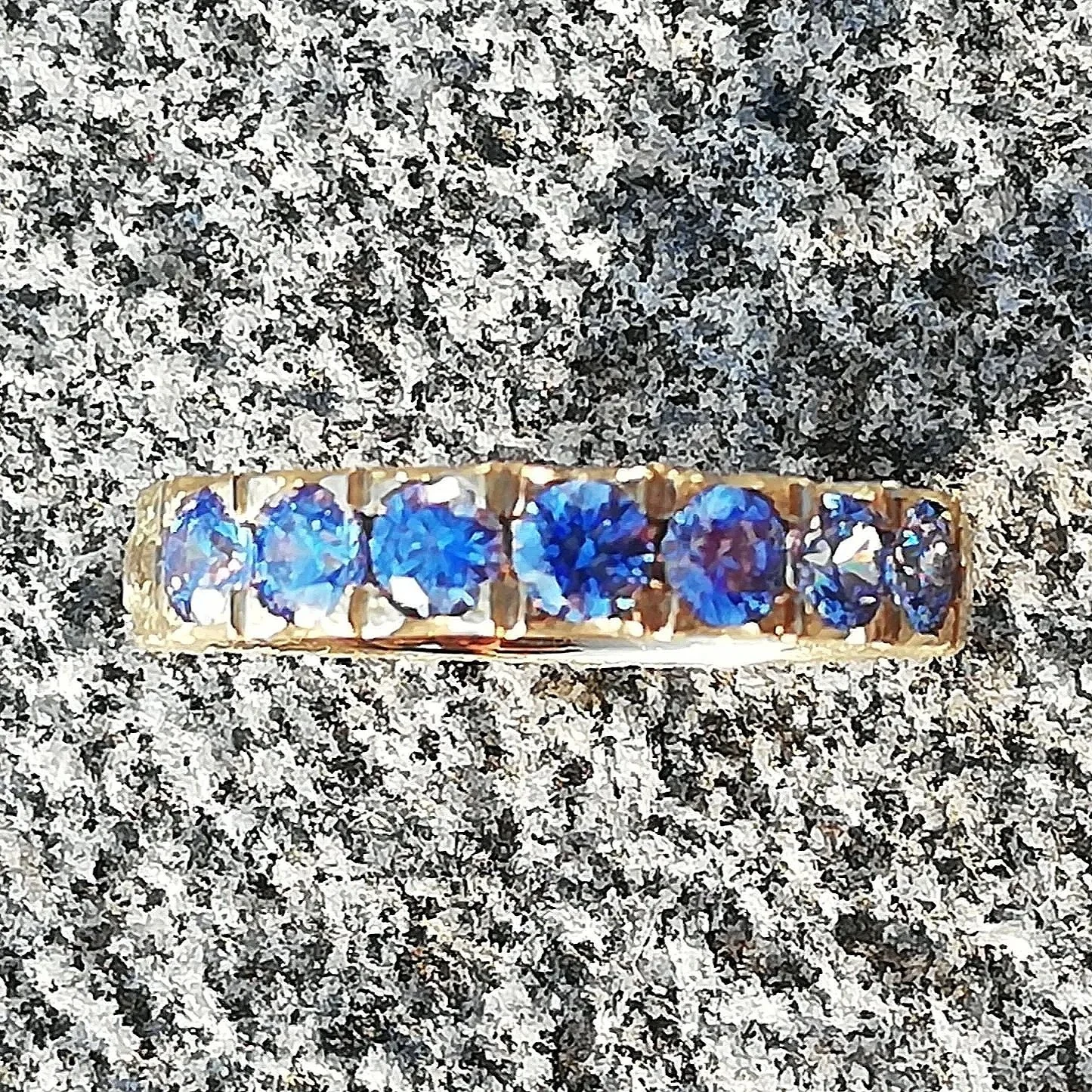 Old Gold ring with blue zirkonia
