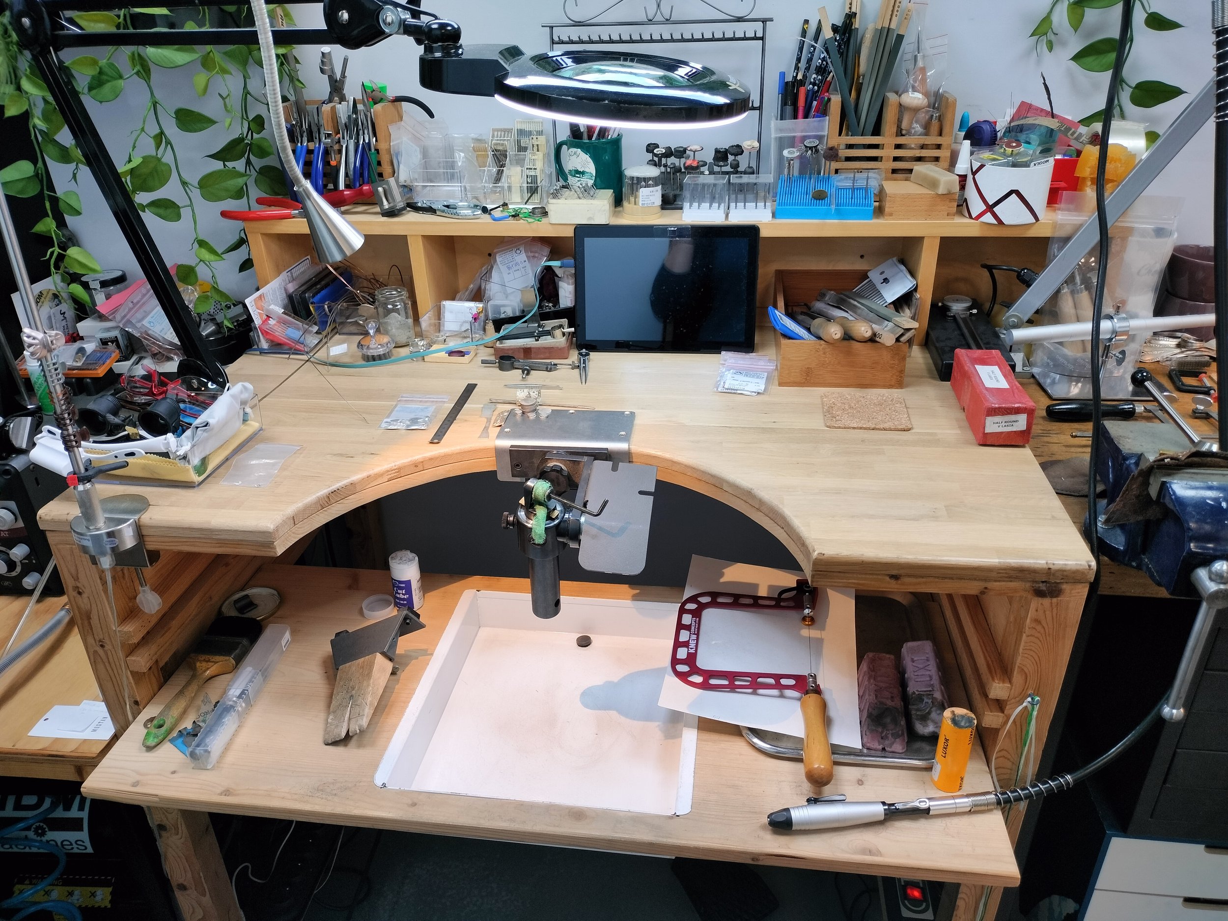 my self made goldsmith bench with tools .