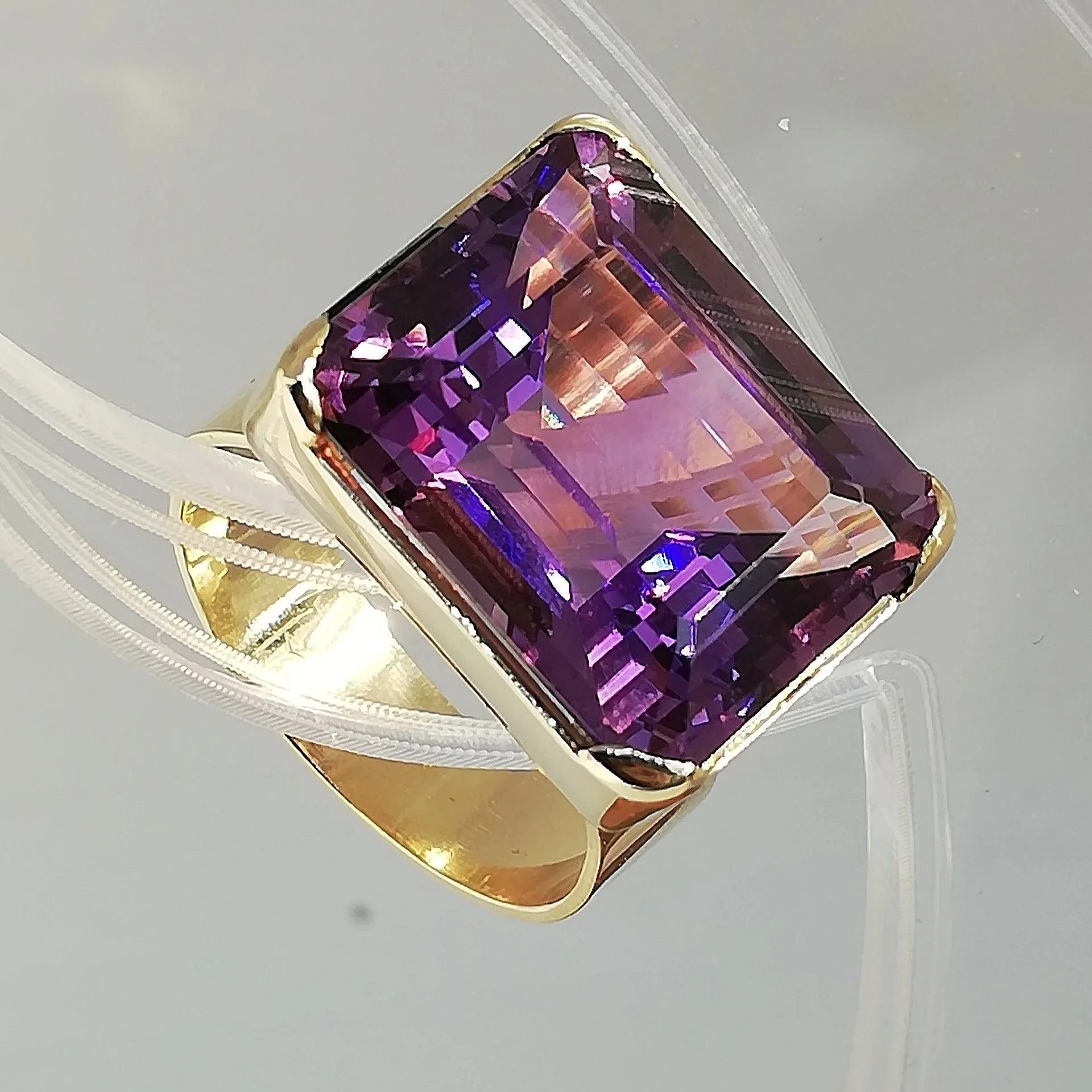 Gold ring with client stone