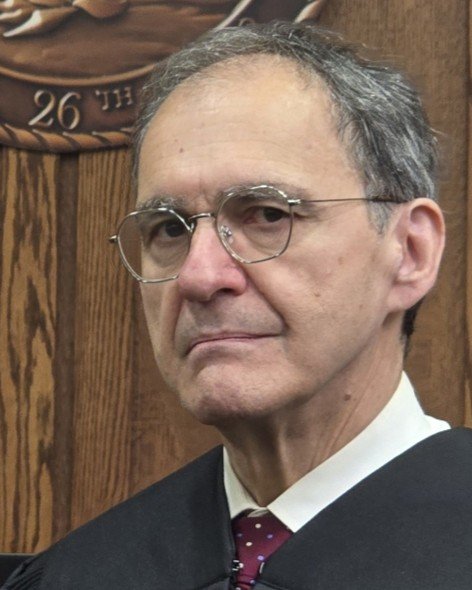 Robed in courtroom CU.jpg