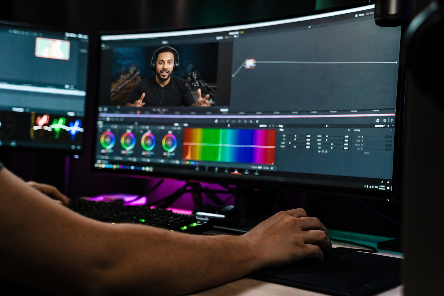 Audio waveform timeline and multi-cam video editing post-production software in a digital audio workstation