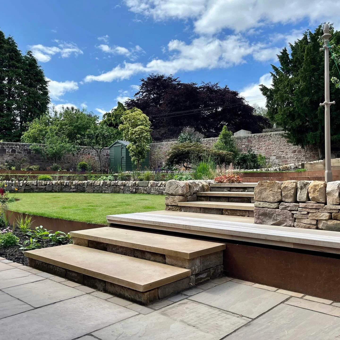 A look back at one of my favourite projects from yester year, once a stark, grassy slope with meagre peripheral planting now a series of dynamic curving terraces with the planting brought in from the edges to create an engaging horticultural haven fo