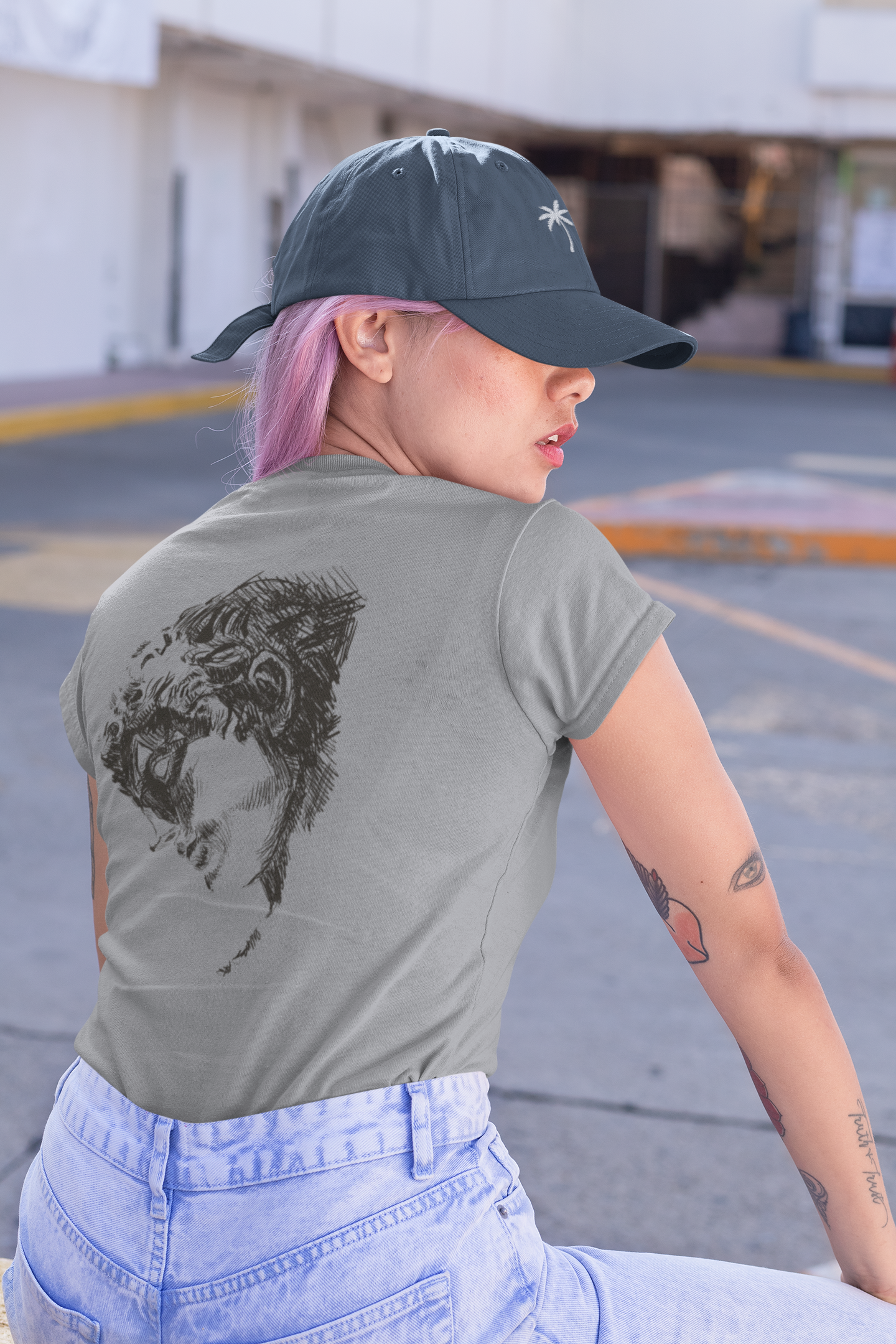 back-view-mockup-of-a-woman-wearing-a-customizable-t-shirt-and-a-dad-hat-31181.png