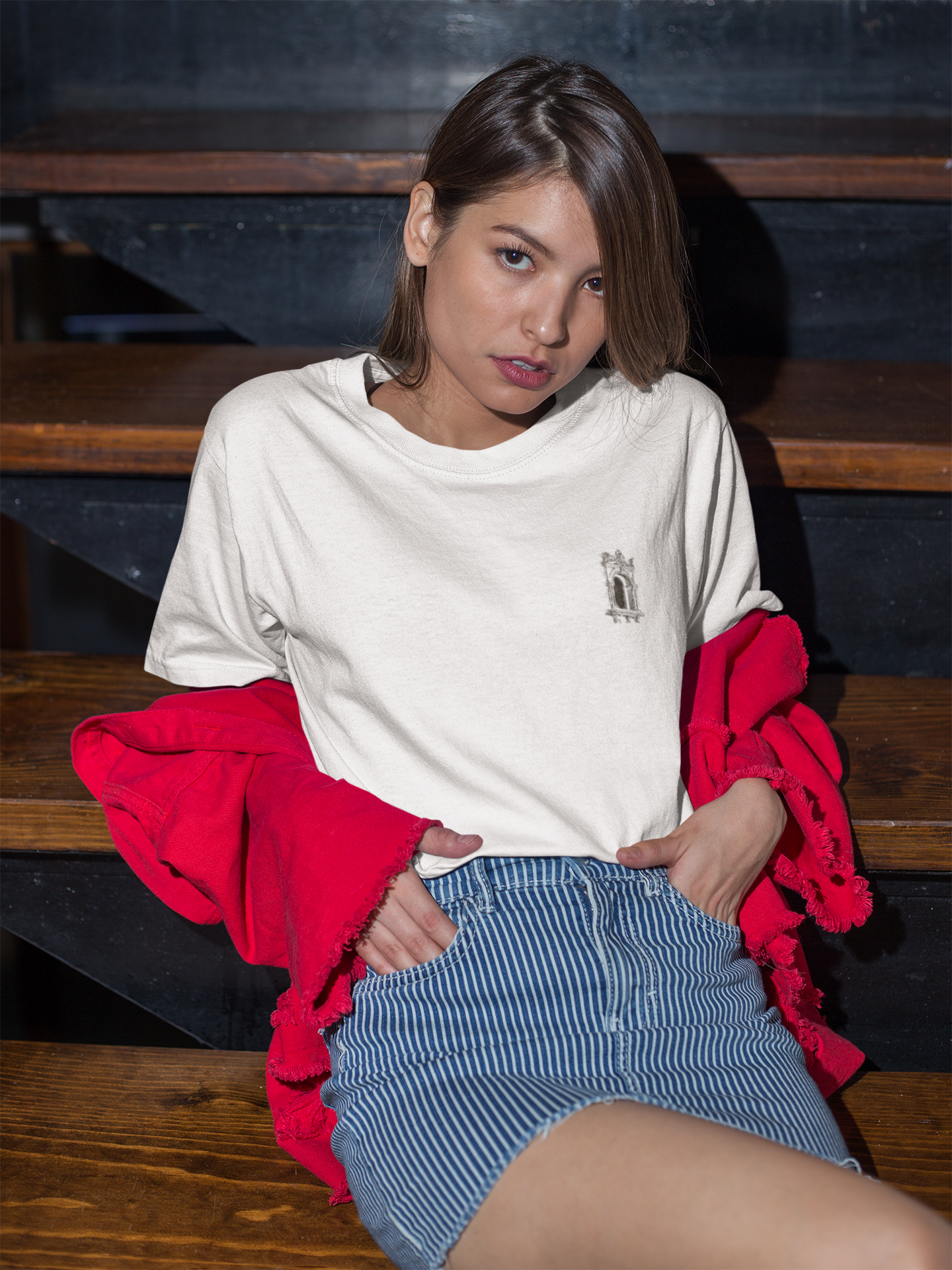 unisex-tee-mockup-featuring-a-stylish-woman-wearing-a-red-jacket-and-a-striped-skirt-22963.png