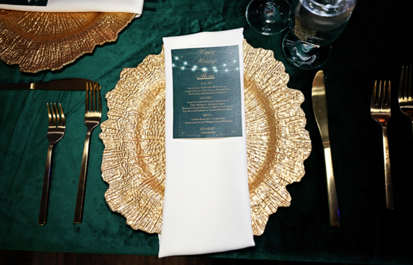 Gold charger plates used in elegant table setting at The Grand View Mansfield event venue