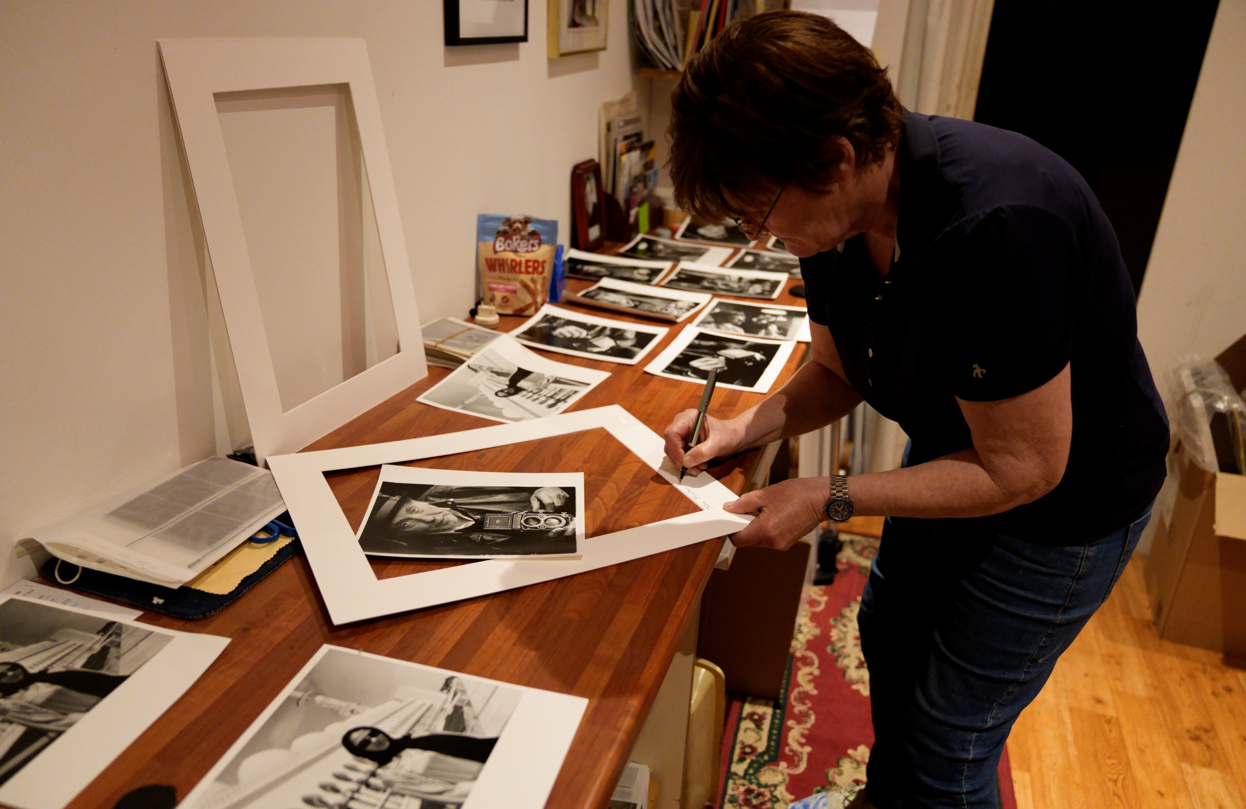 Hetty Walsh signing her artwork.png