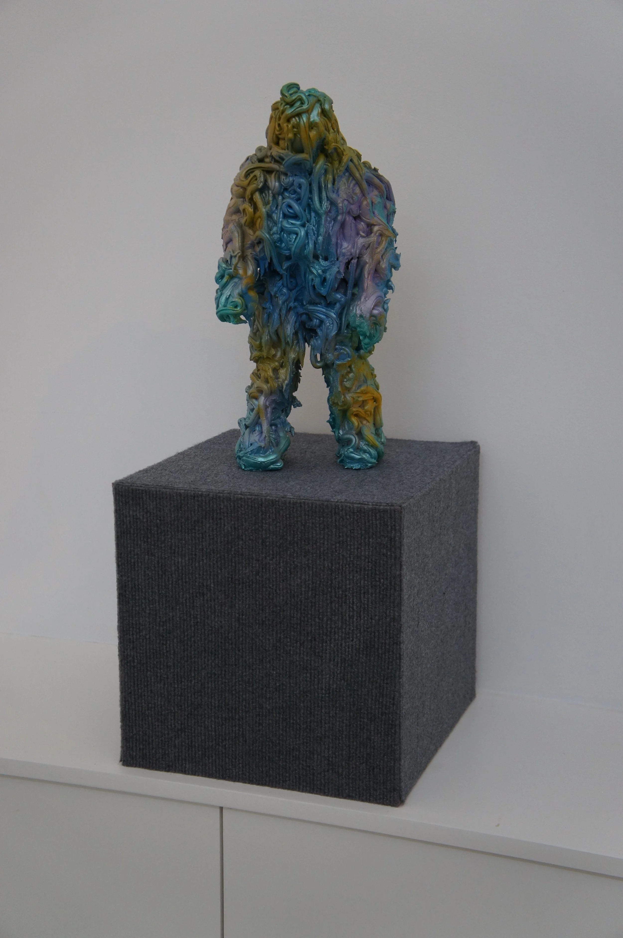John Nicol, An Abominable object 2, 2012, Acrylic Sealant and Spray paint on a Plastic Action Figure on an MDF and carpet Tile plinth.JPG