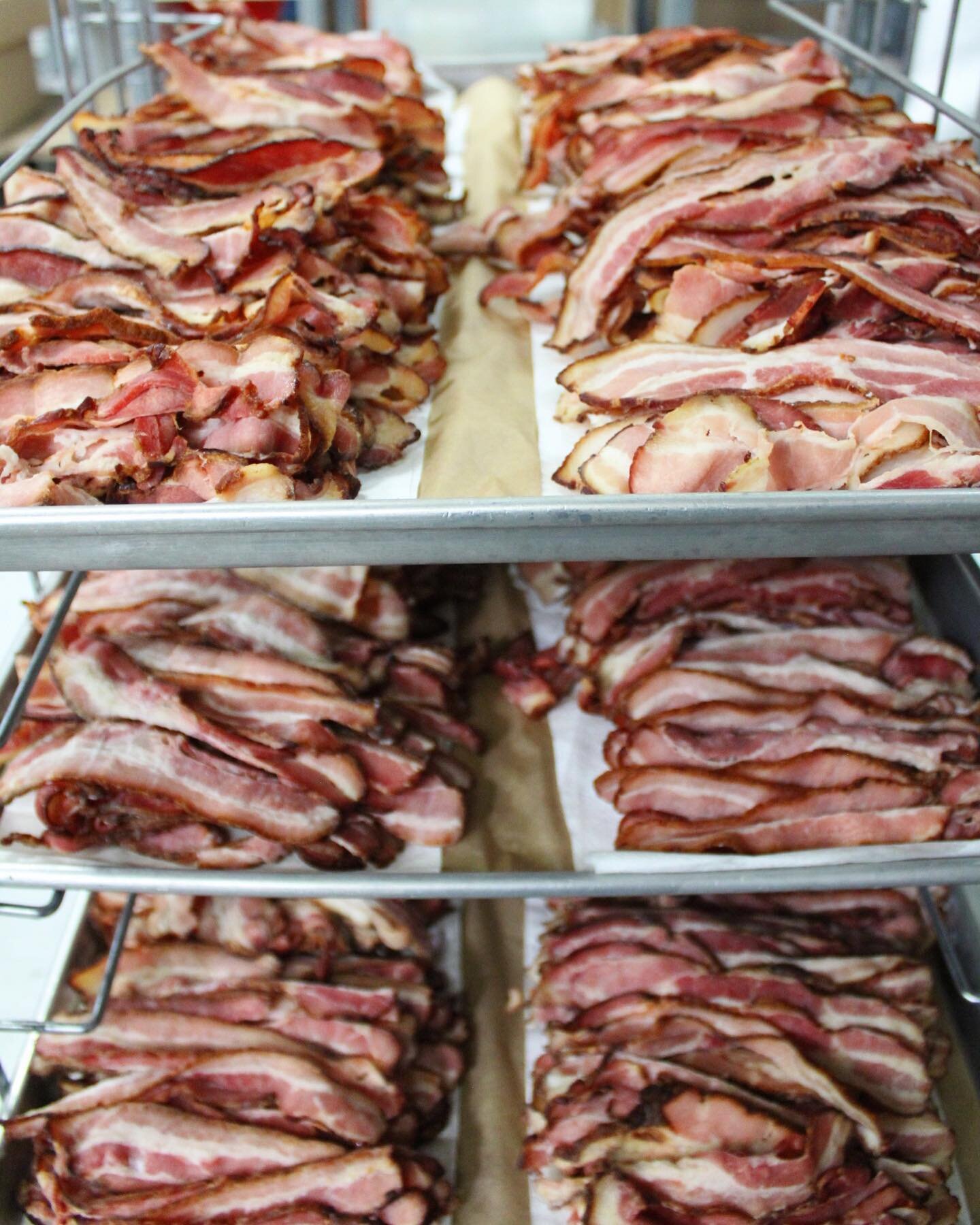 Stackin&rsquo; and rackin&rsquo; bacon this morning 🥓🥓🥓

Wanting to add proteins to your product but need certification to process it? 🙋🏻✅ As an USDA inspected facility, we are here to help with meat prep and cooking for you!