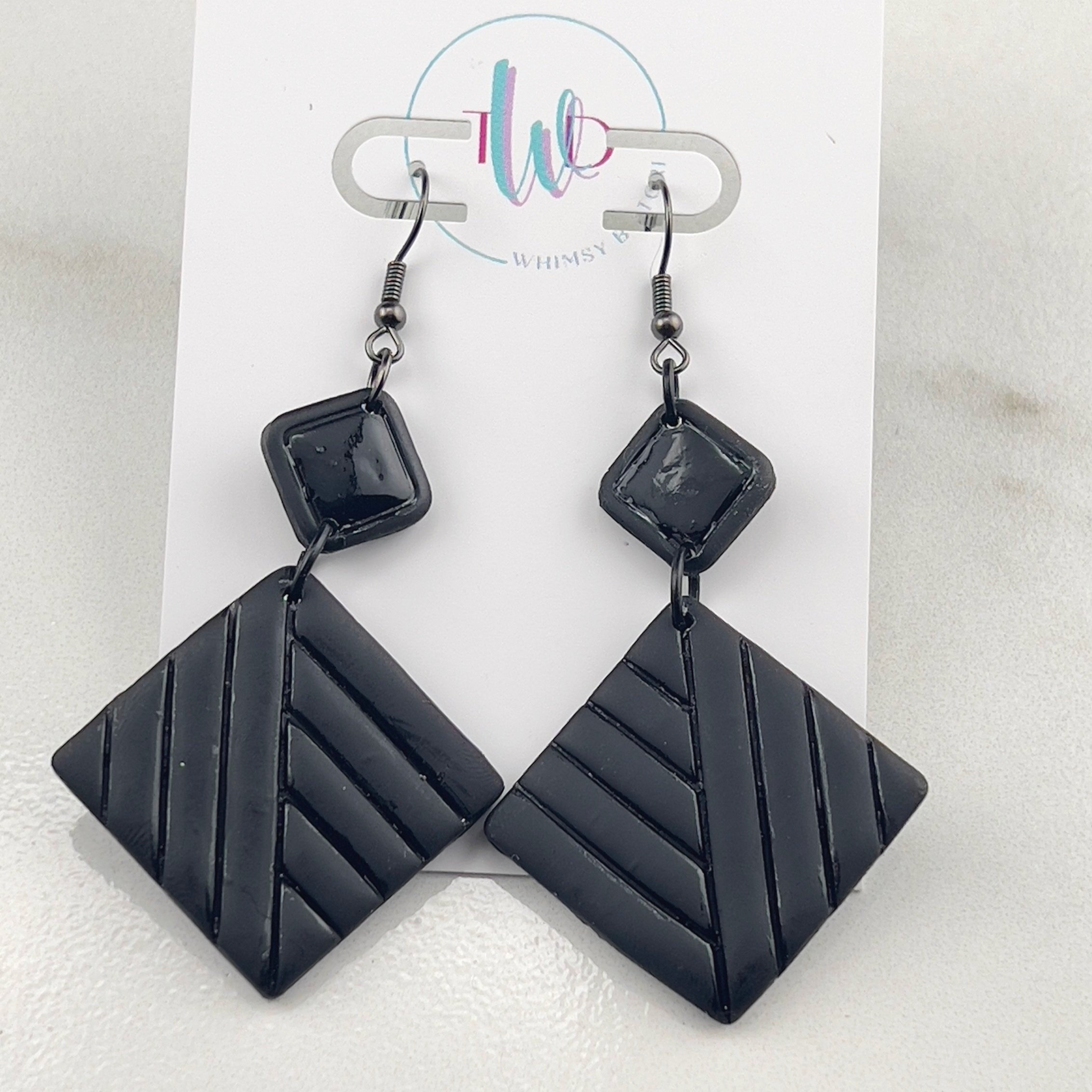 Black embossed square dangles