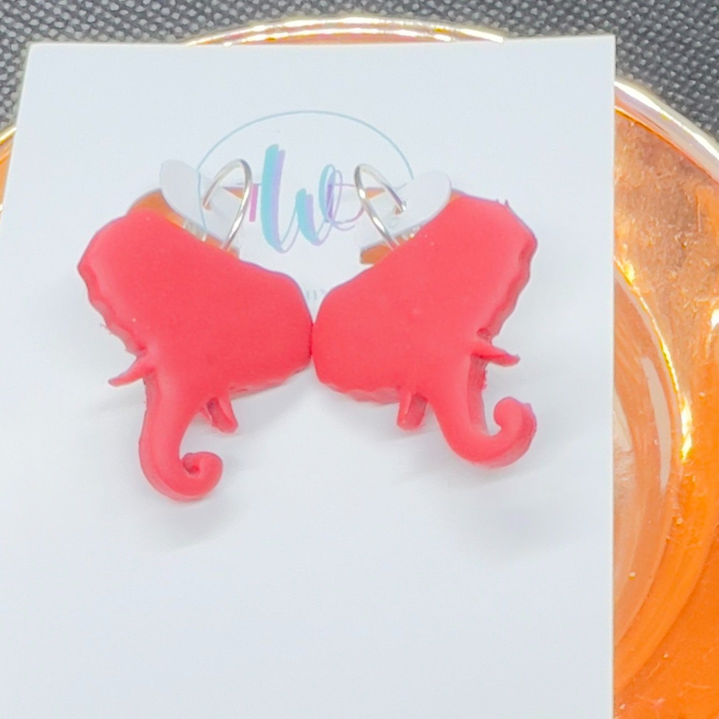 Red elephant lever back earrings