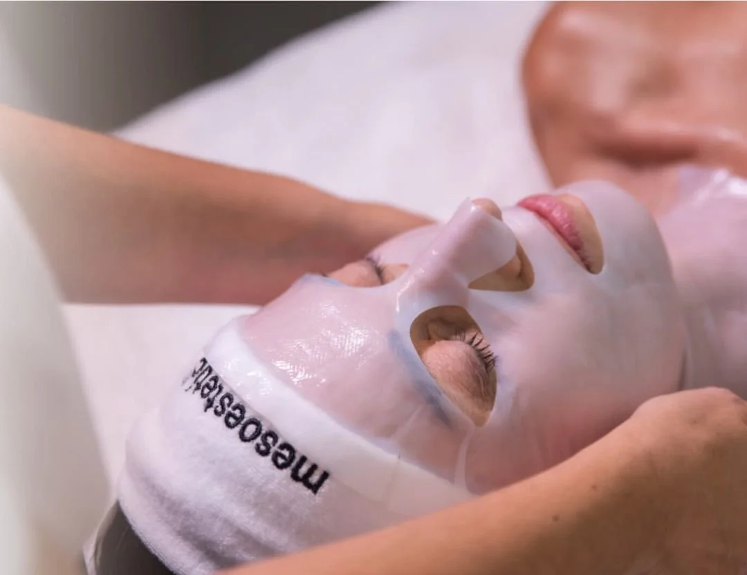 Close up of woman's face getting chemical peel