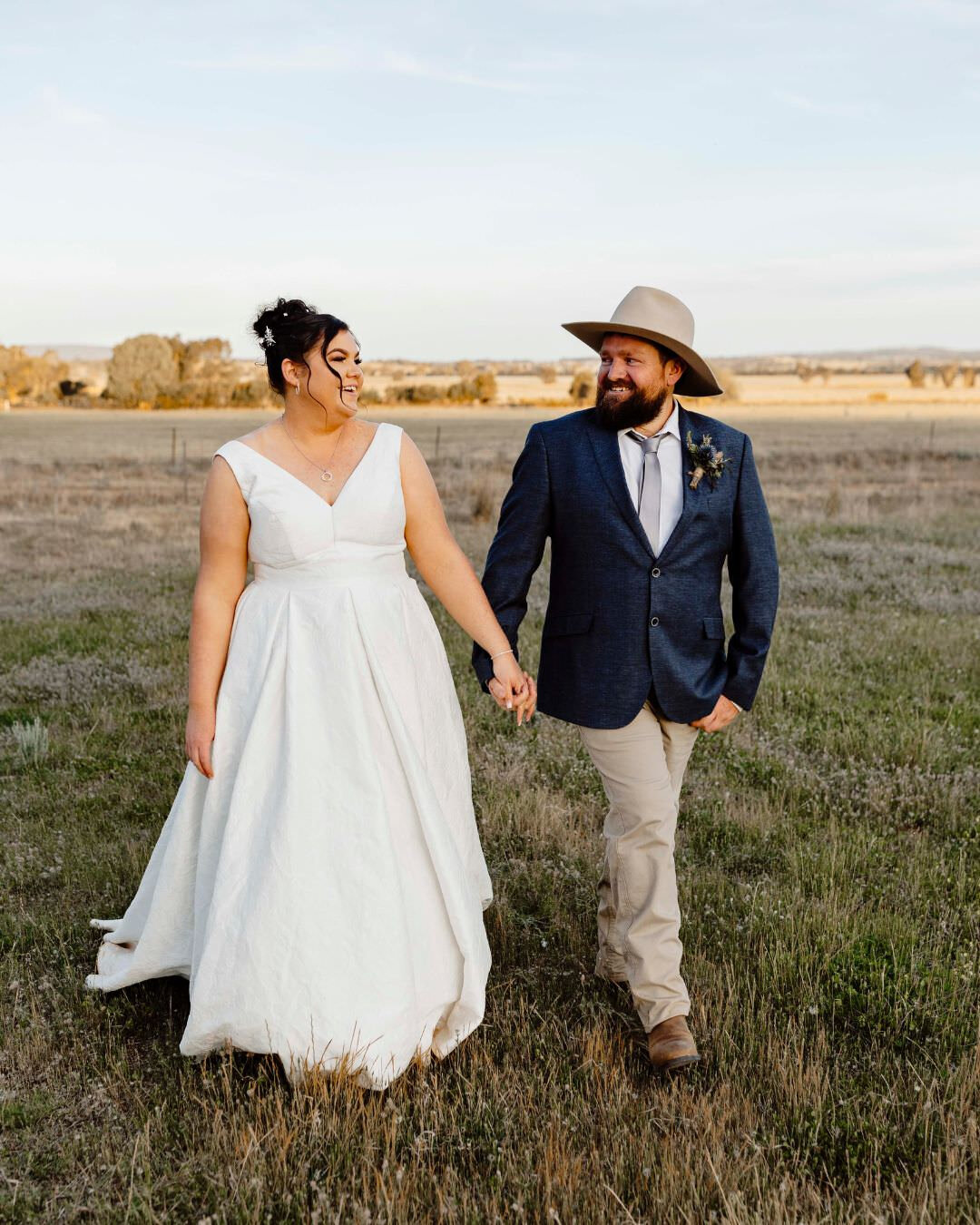 A few sneek peeks from Mandy and Anthony's beautiful wedding at their property just outside of Forbes. Such beautiful light and so many smiles all day! ⁣
#weddingforbes #forbesweddingphotographer #countryweddingnsw  #orangewedding #kirstencunninghamp