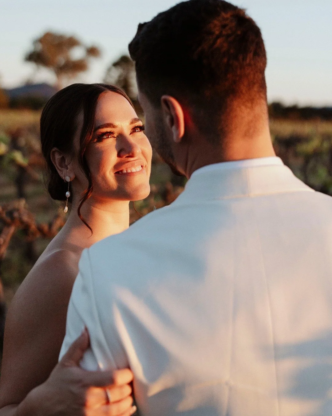 Minimal styling, shared plates, and soft light spilling across @blue_wren_farm &mdash; Tess &amp; Christian&rsquo;s day was effortless elegance.

Married beneath spring blossoms with the first vineyard buds, the scene felt natural and refined. Tess w