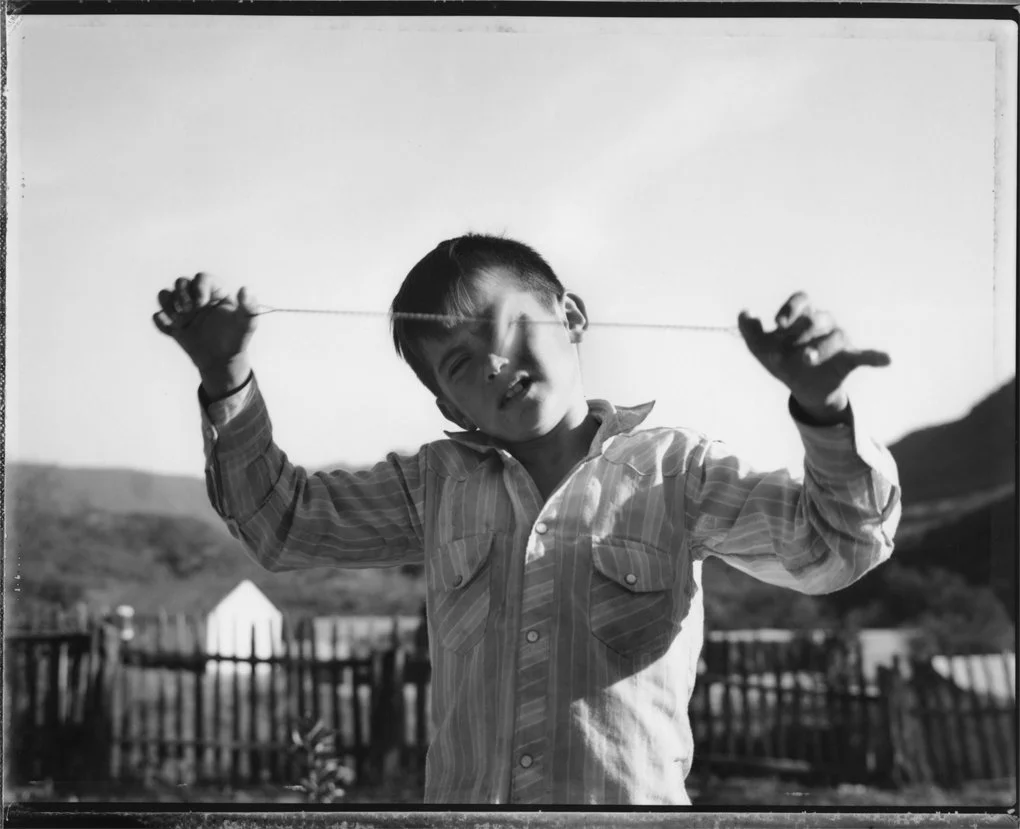  Boy with String Whirl 
