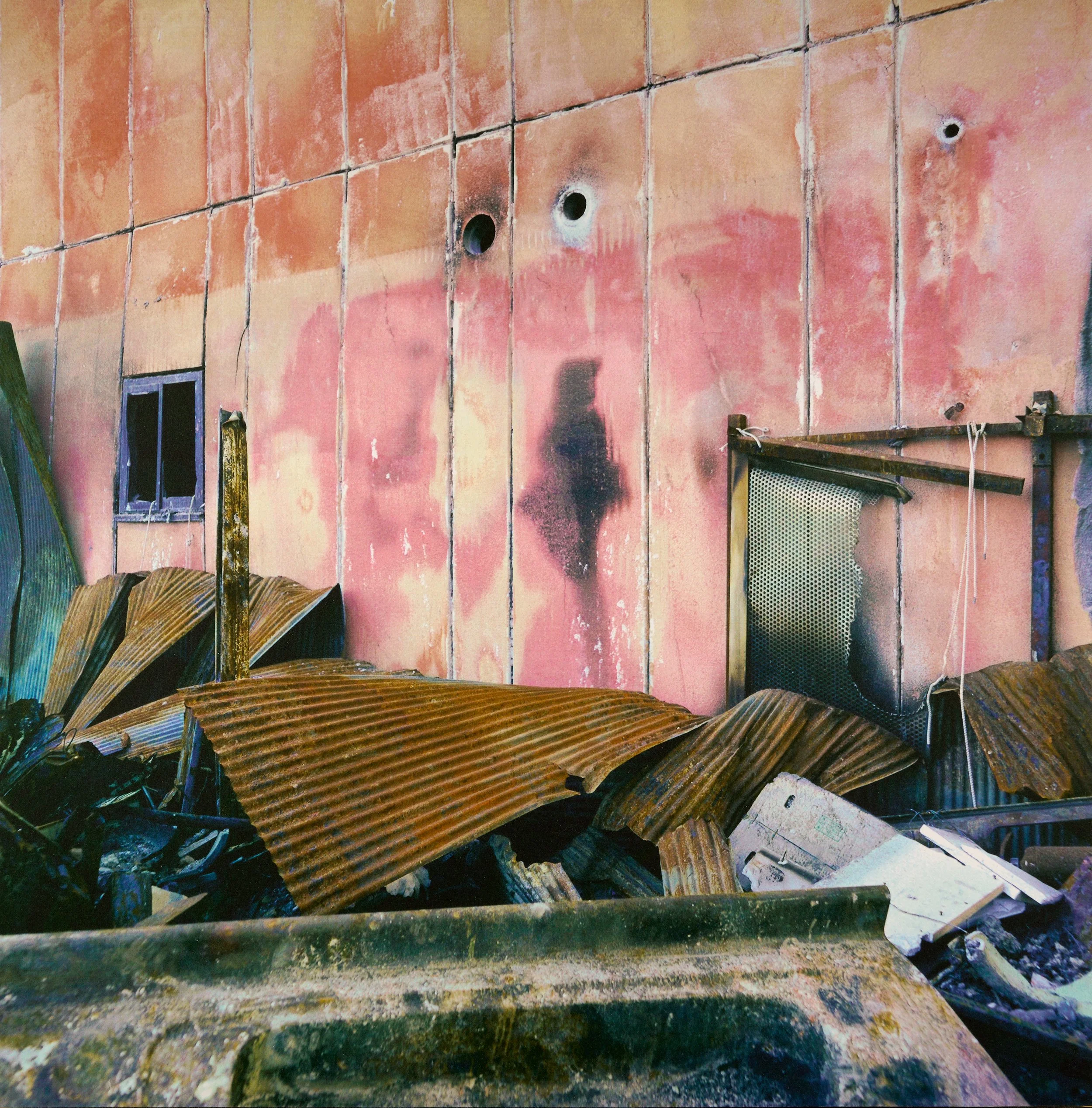 Figure like form on burned wall.jpg