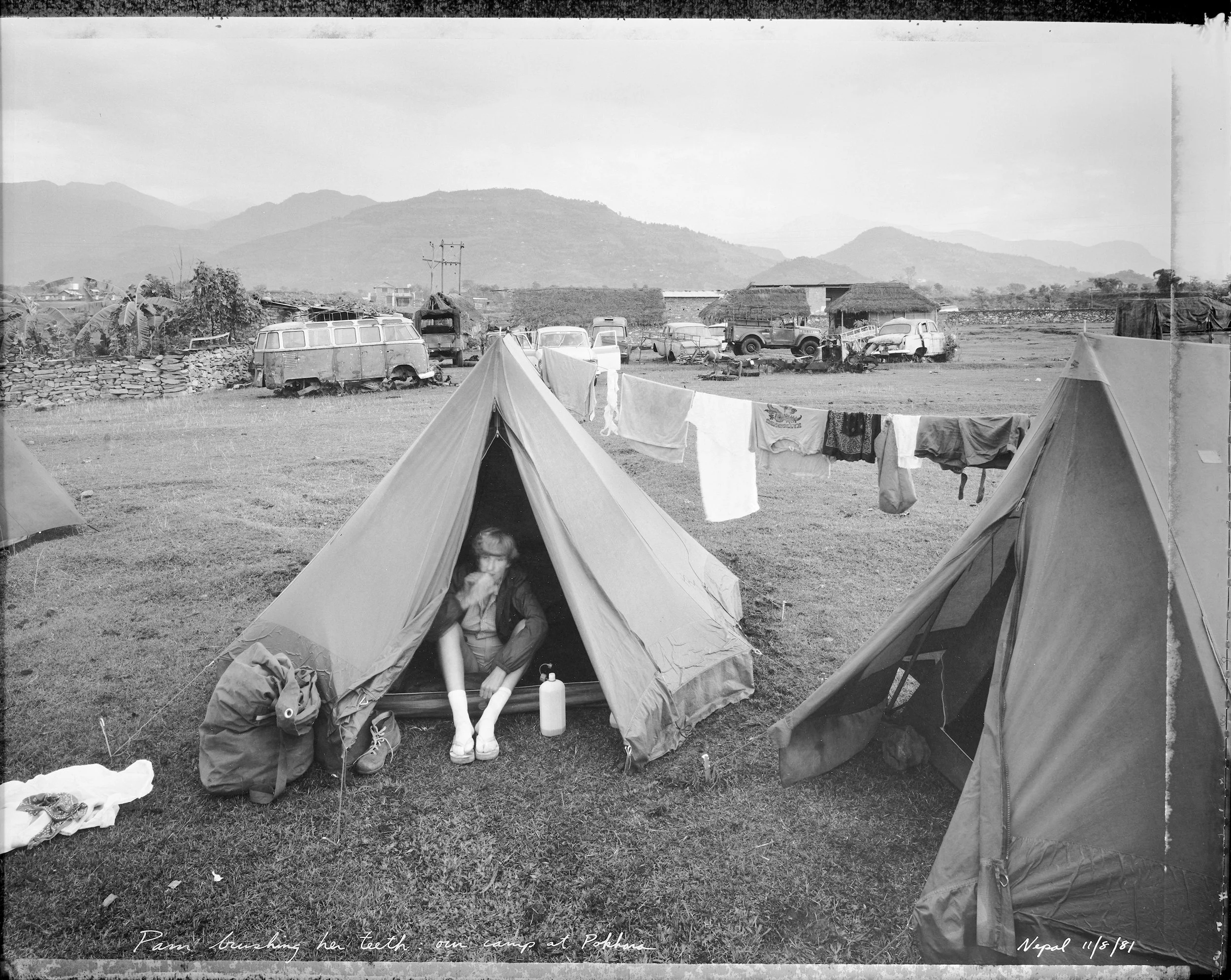  Pam brushing her teeth, our camp at Pokhara Nepal   (11/8/81)