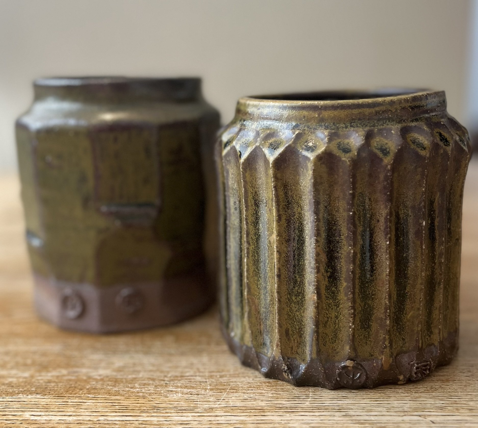 Faceted and fluted Tenmoku glazed vessels