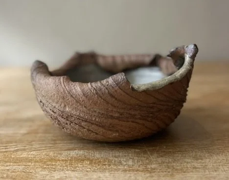 Spiral textured vessel, rounded body.