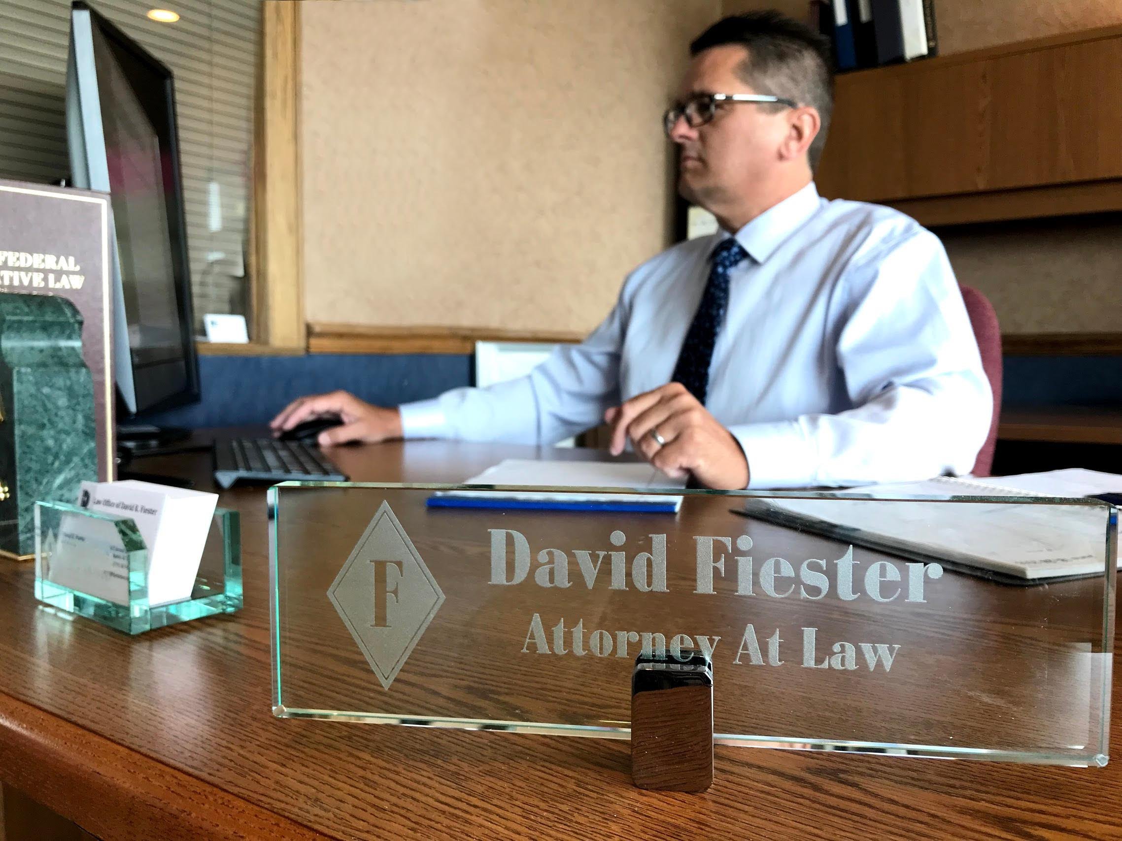 Cedar Rapids family attorney working at a desk