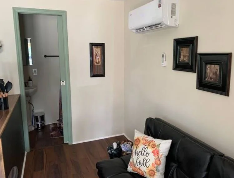 Hunters Cove's open concept that leads into the bathroom.