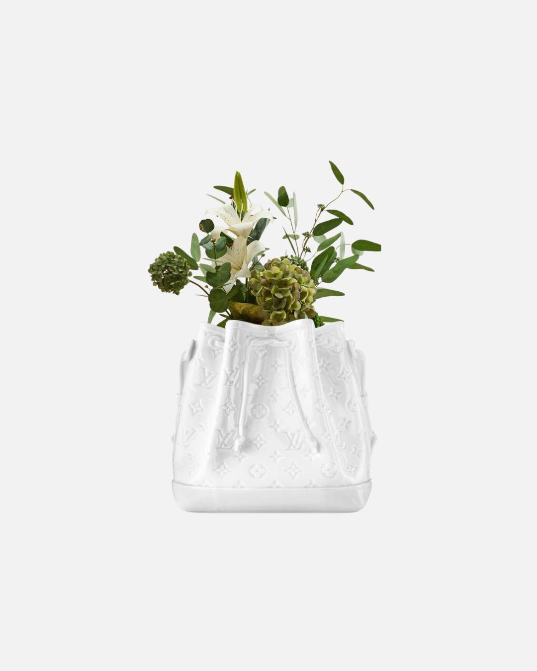 A little piece of Louis Vuitton, in bloom. 🌸✨
@louisvuitton  brings its heritage into the world of interiors with a delicate porcelain vase inspired by the Maison&rsquo;s universe. Decorative yet refined, it gives flowers and spaces alike a touch of