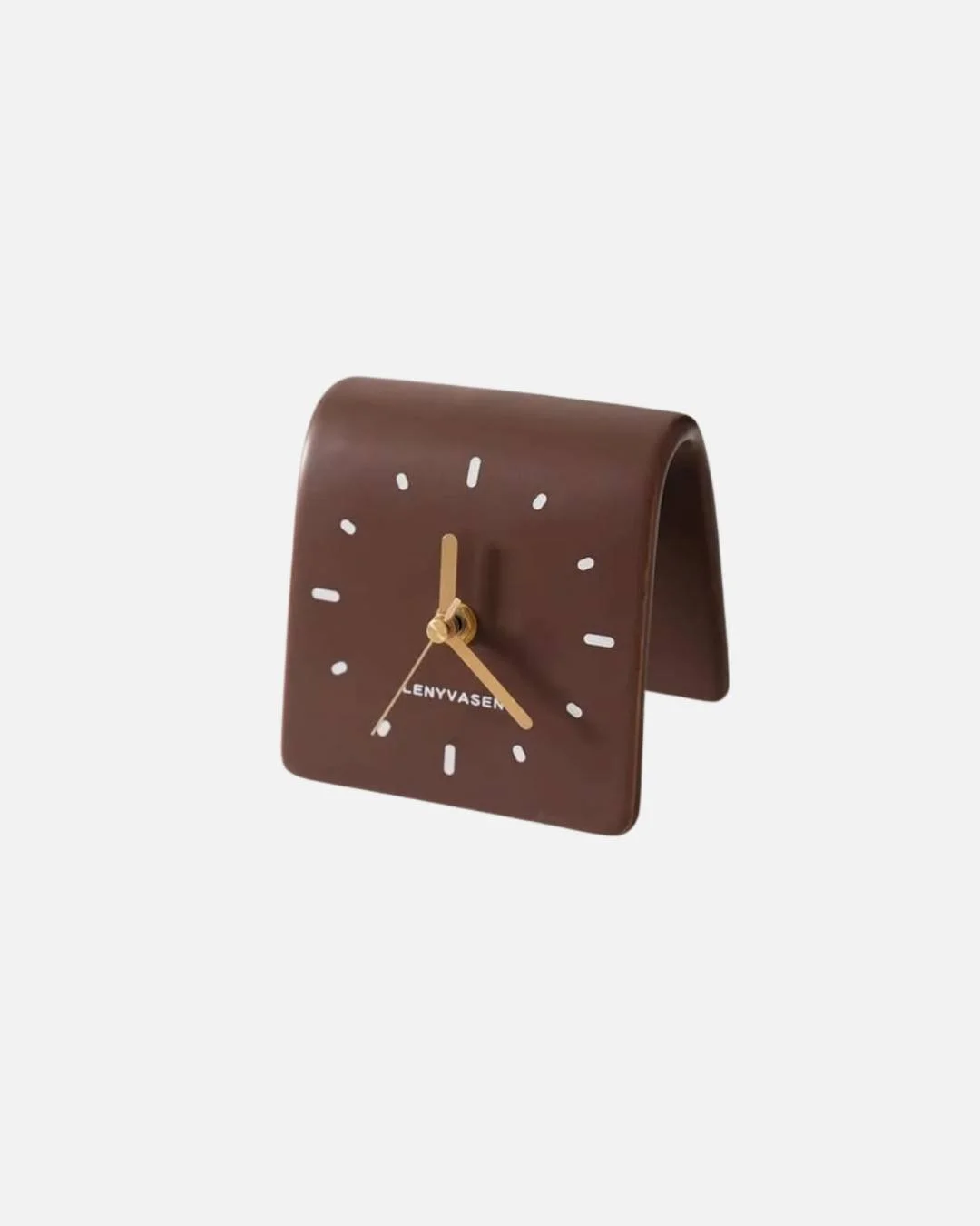 Time, distilled. ⏰✨
This @lenyvasen  desk clock proves that great design doesn&rsquo;t need to shout. Compact, sculptural, and impeccably balanced, it transforms a functional object into a statement of quiet sophistication. With its clean lines and a