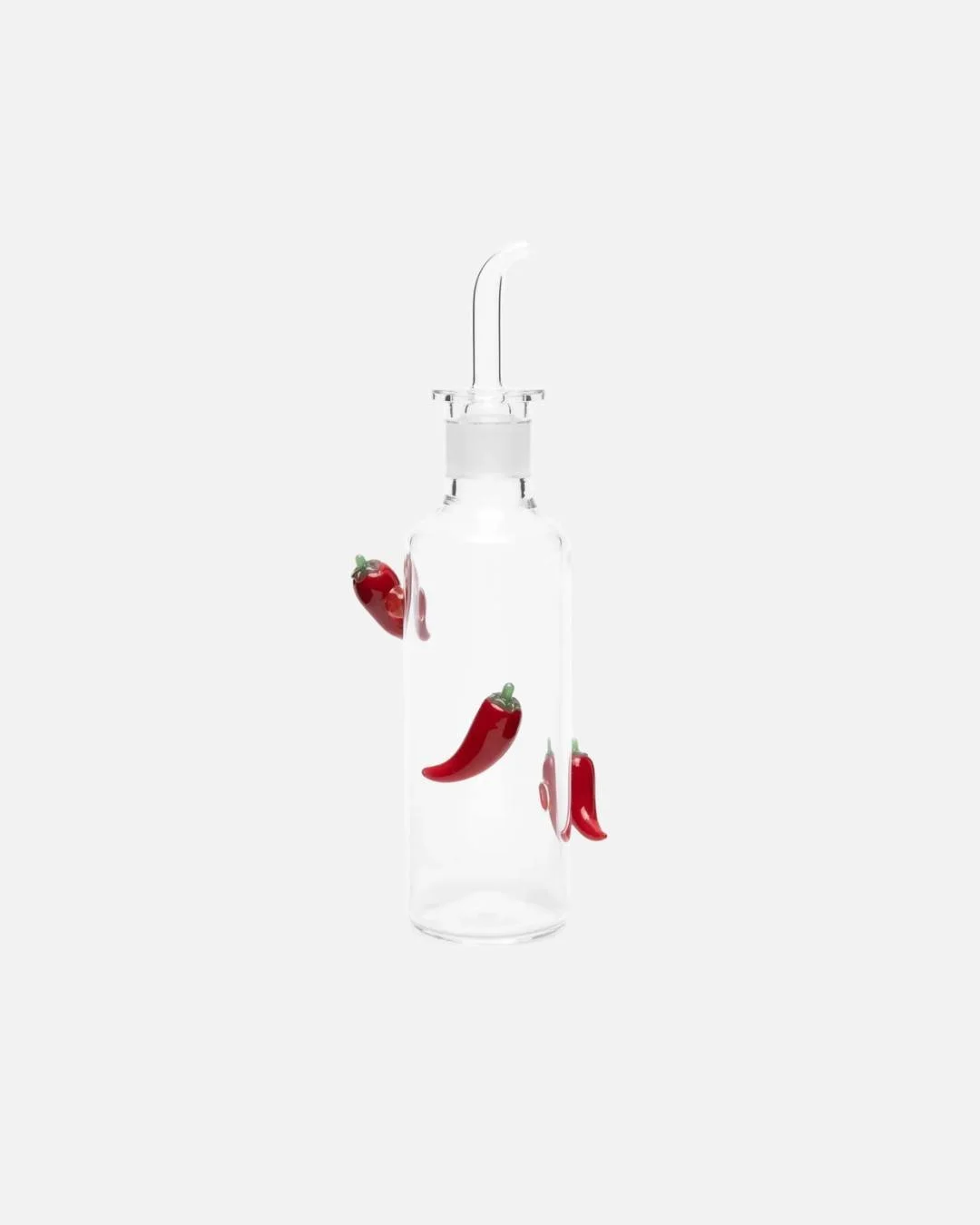 Turn up the heat. 🌶️✨
This @maisonbalzac  chili oil bottle transforms a kitchen staple into a playful work of art. Adorned with vibrant glass peppers, it brings color, character, and a touch of spice to the table. Equal parts functional and decorati
