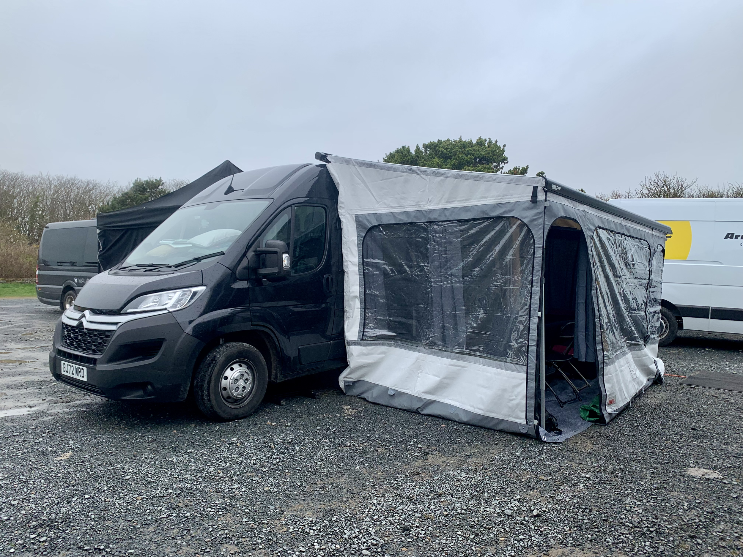 Hair and makeup van in rain with awning and heated privacy room for shelter
