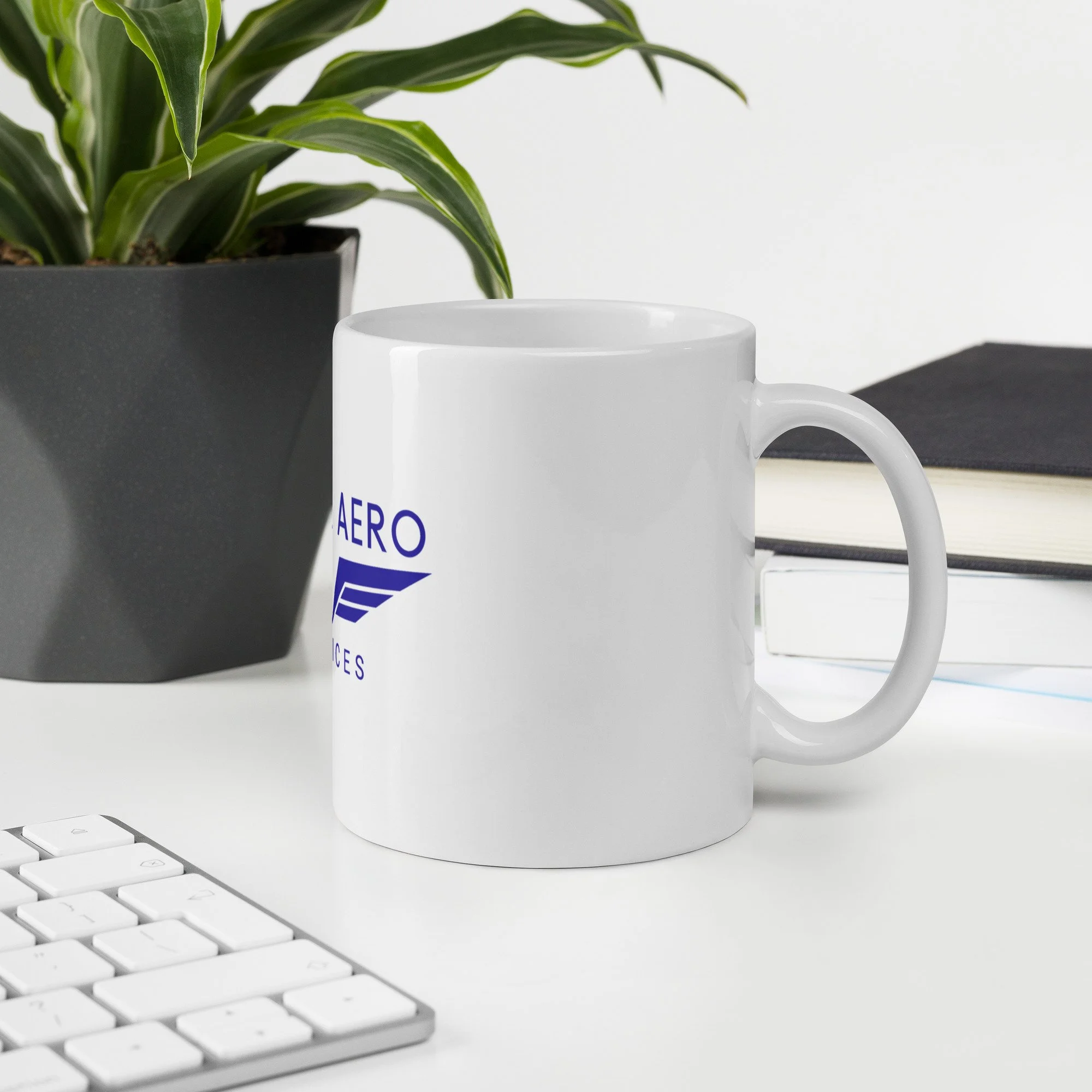 white-glossy-mug-white-11-oz-office-environment-66d780cc20368.jpg