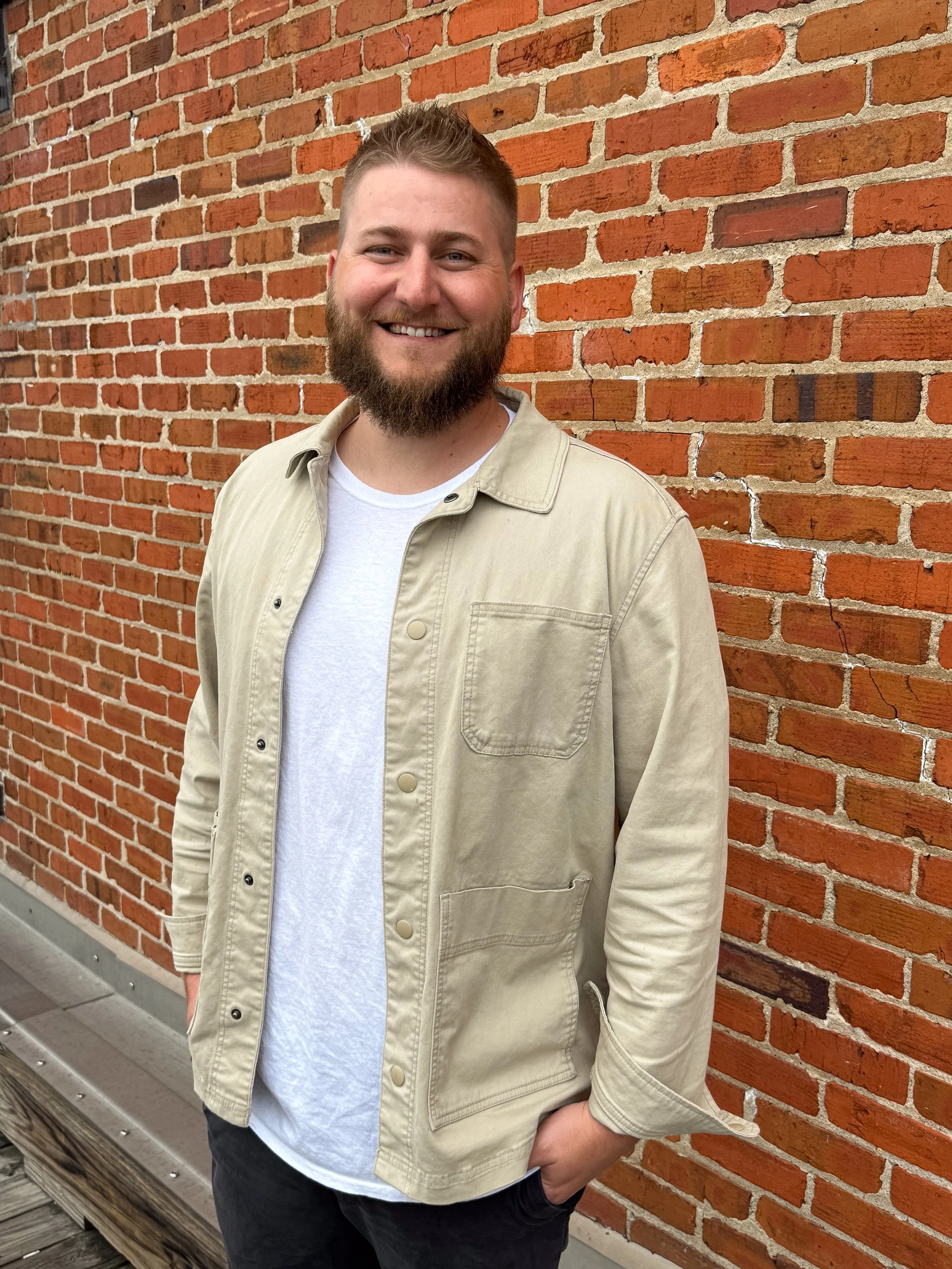 A gray silhouette of a person with no discernible features.