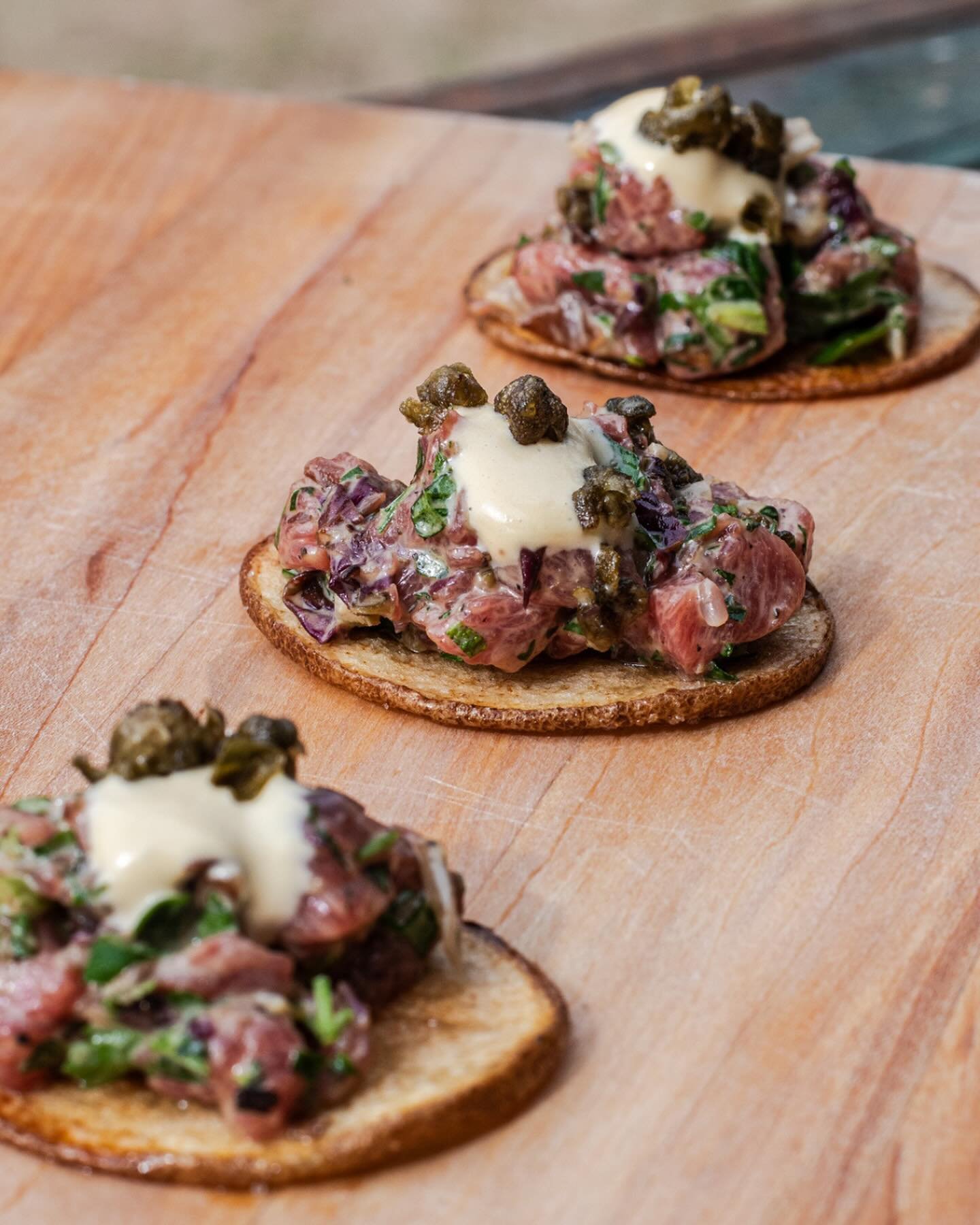 📸: Tartare&nbsp;of NC Grass Fed NY Strip with Wilted Endive + Charred Radicchio, House Cured Egg Yolk, Crispy Capers, and Caesar Aioli on a Sage and Thyme Brown Butter House Potato Chip

Always a crowd-pleaser at every party!

Find this on our Tasty