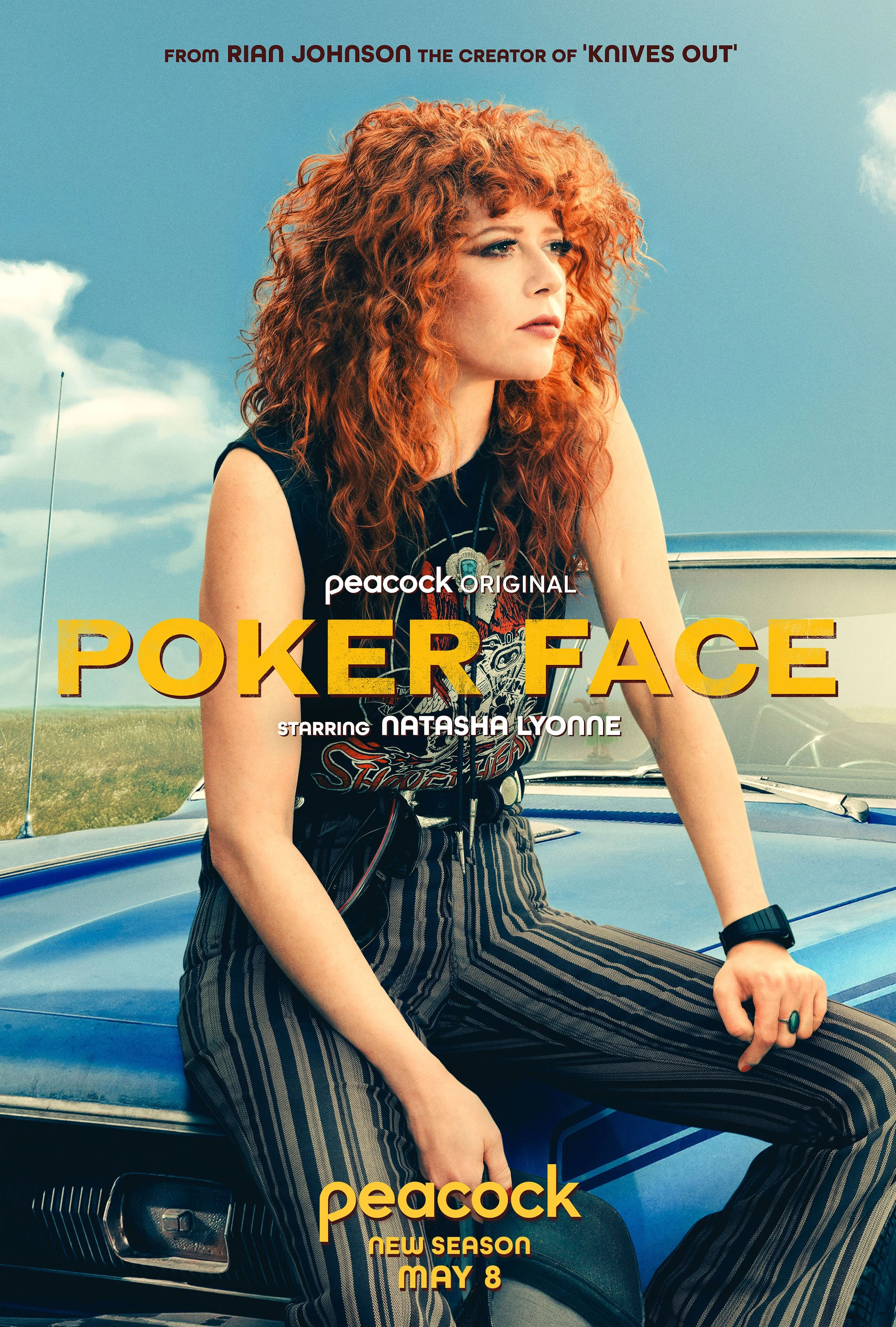Poster for the TV show 'Poker Face' featuring Natasha Lyonne with curly red hair, sitting on the hood of a blue car in a grassy open field under a bright sky. The poster promotes a new season premiering on May 8 on Peacock.